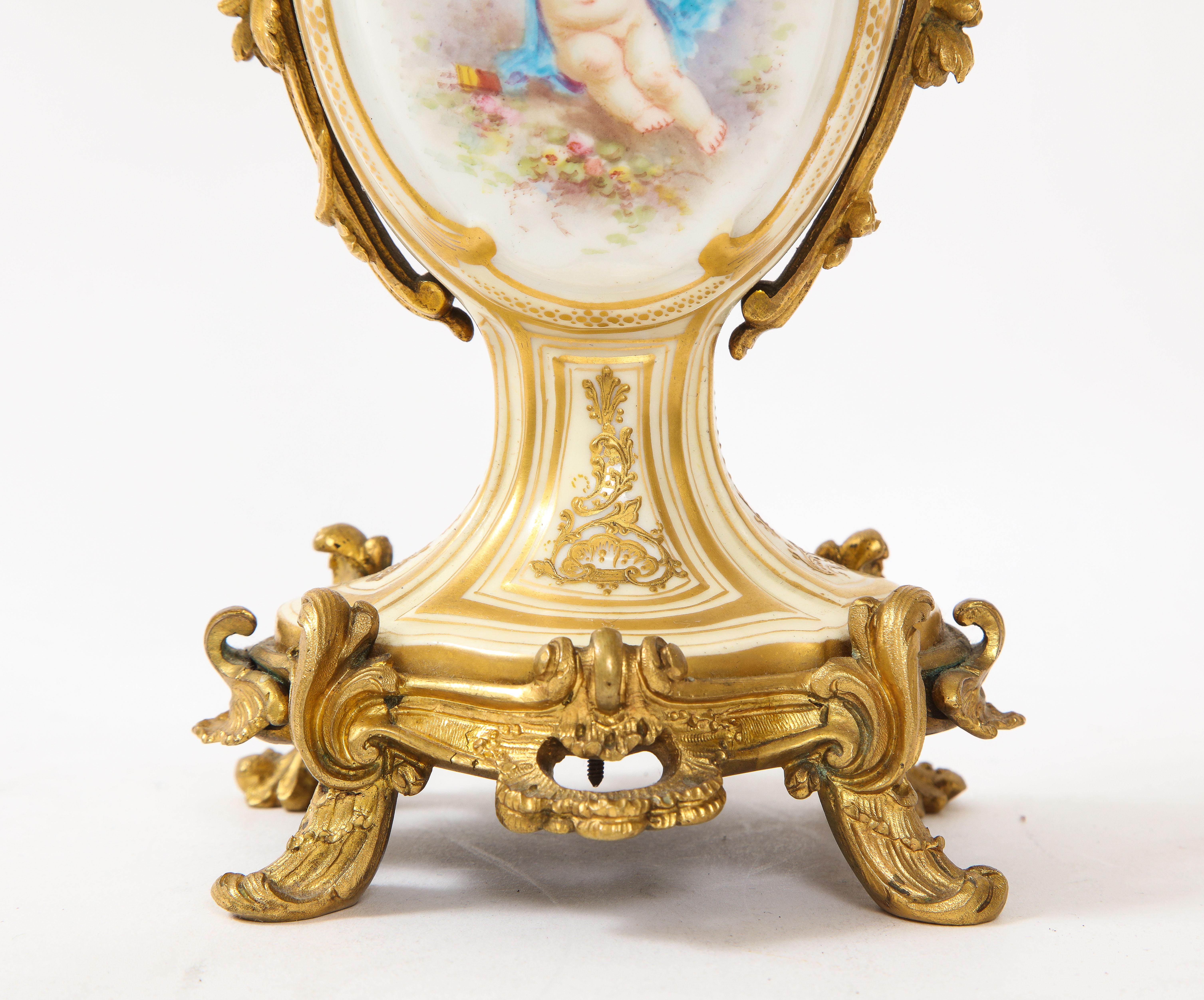 3-Piece Sevres Porcelain and Dore Bronze Mnt. Clock and Candelabra Garniture For Sale 11