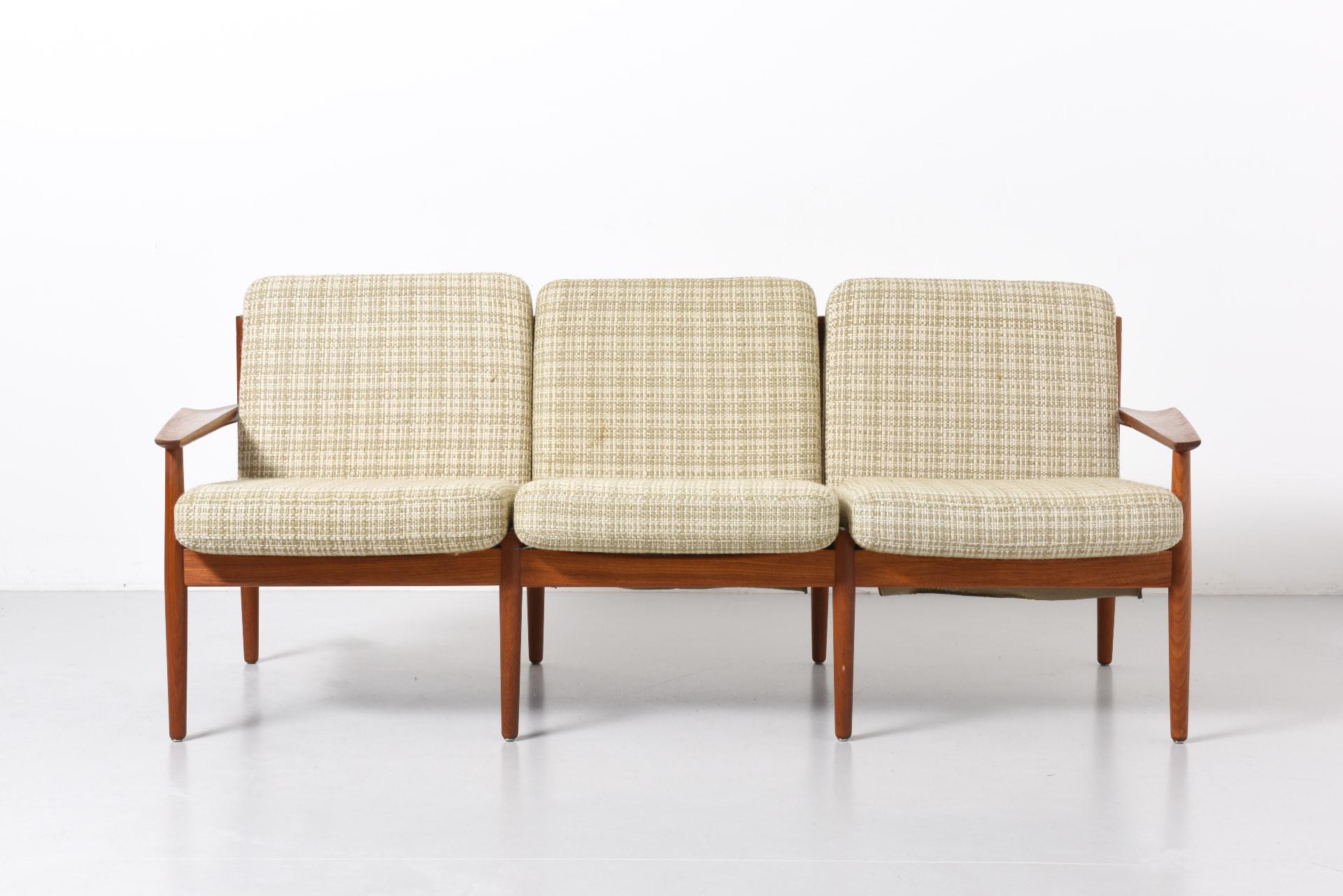 3-seat sofa in teak with original cushions. Design by Arne Vodder in the 1960s. Made in Denmark by Glostrup Møbelfabrik.
 