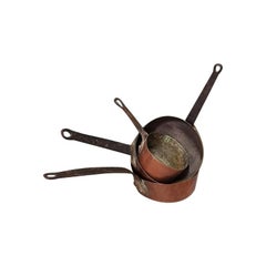 A 4 Piece 19th Century French Copper Pans with Wrought Iron Handles.