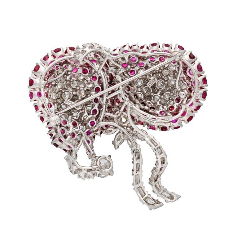 A 95 Diamond Platinum, Ruby Brooch  In Excellent Condition For Sale In New York, US