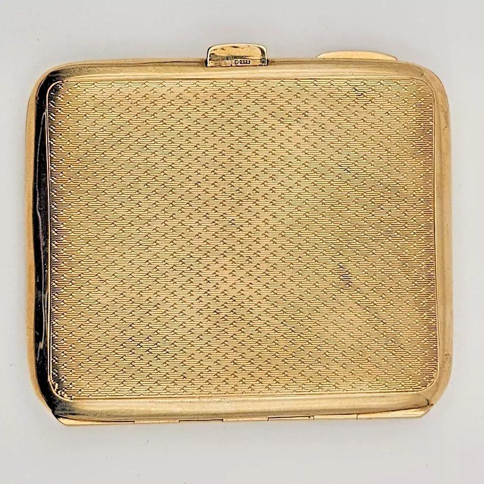 A 9ct Gold Engine Turned Cigarette Case by Turner & Simpson B/Ham 2