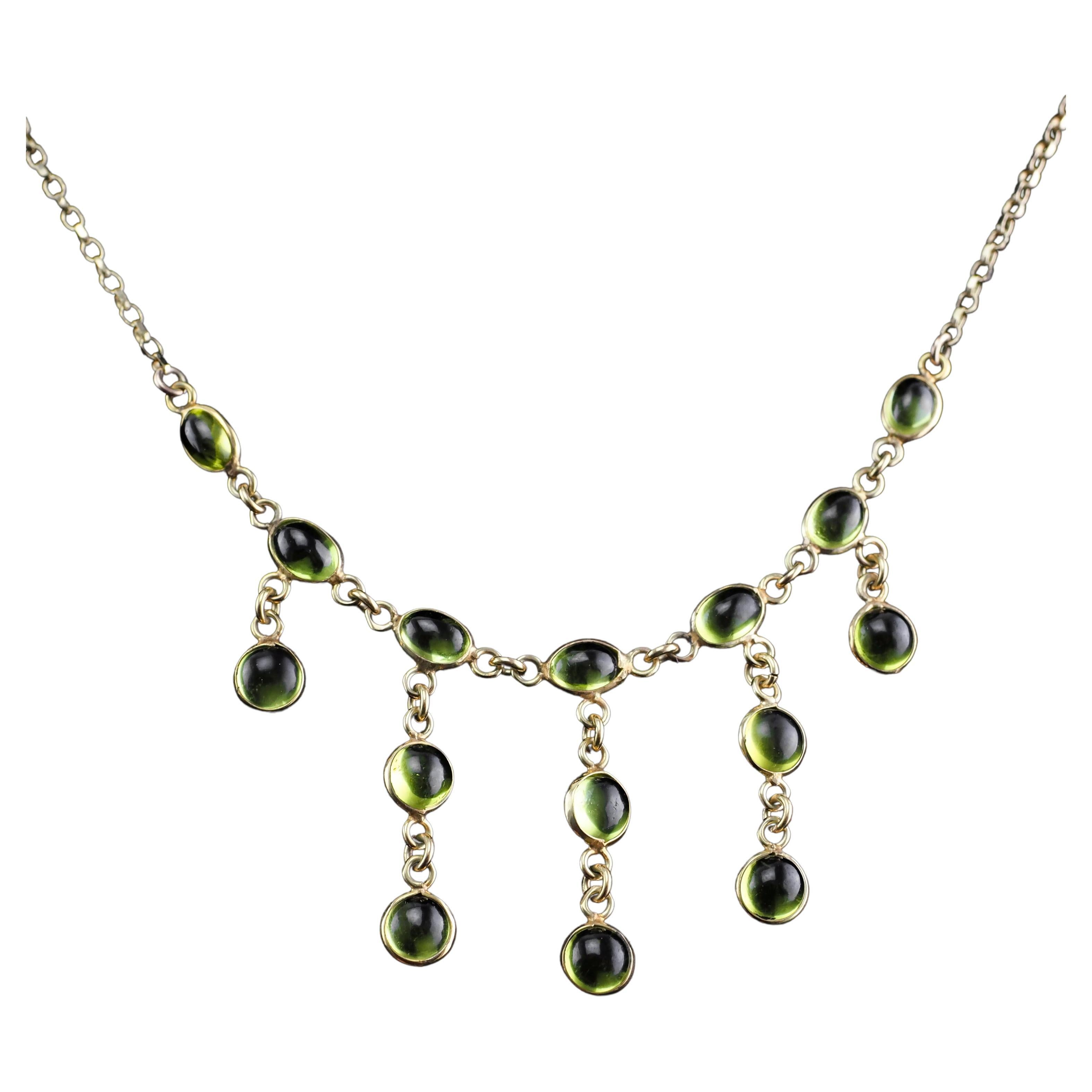 9 Carat Gold Peridot Cabochon Cascade Drop Necklace For Sale