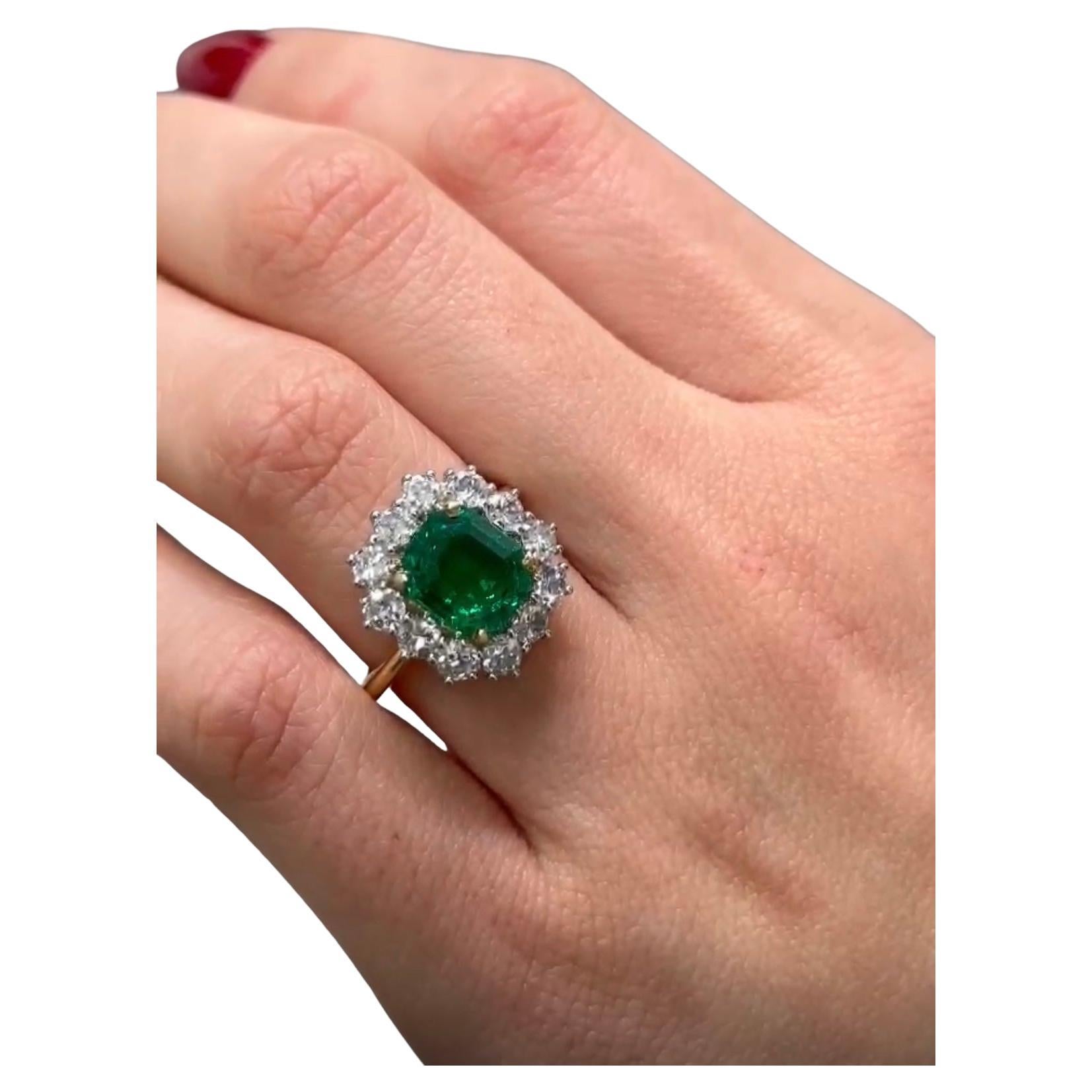 A AGL Certified 18 karat white gold  2.98 Columbian Emerald Diamond Ring