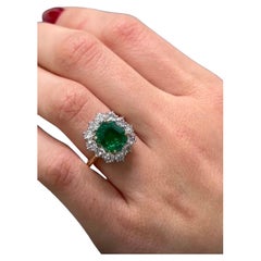 A AGL Certified 18 karat white gold  2.98 Columbian Emerald Diamond Ring