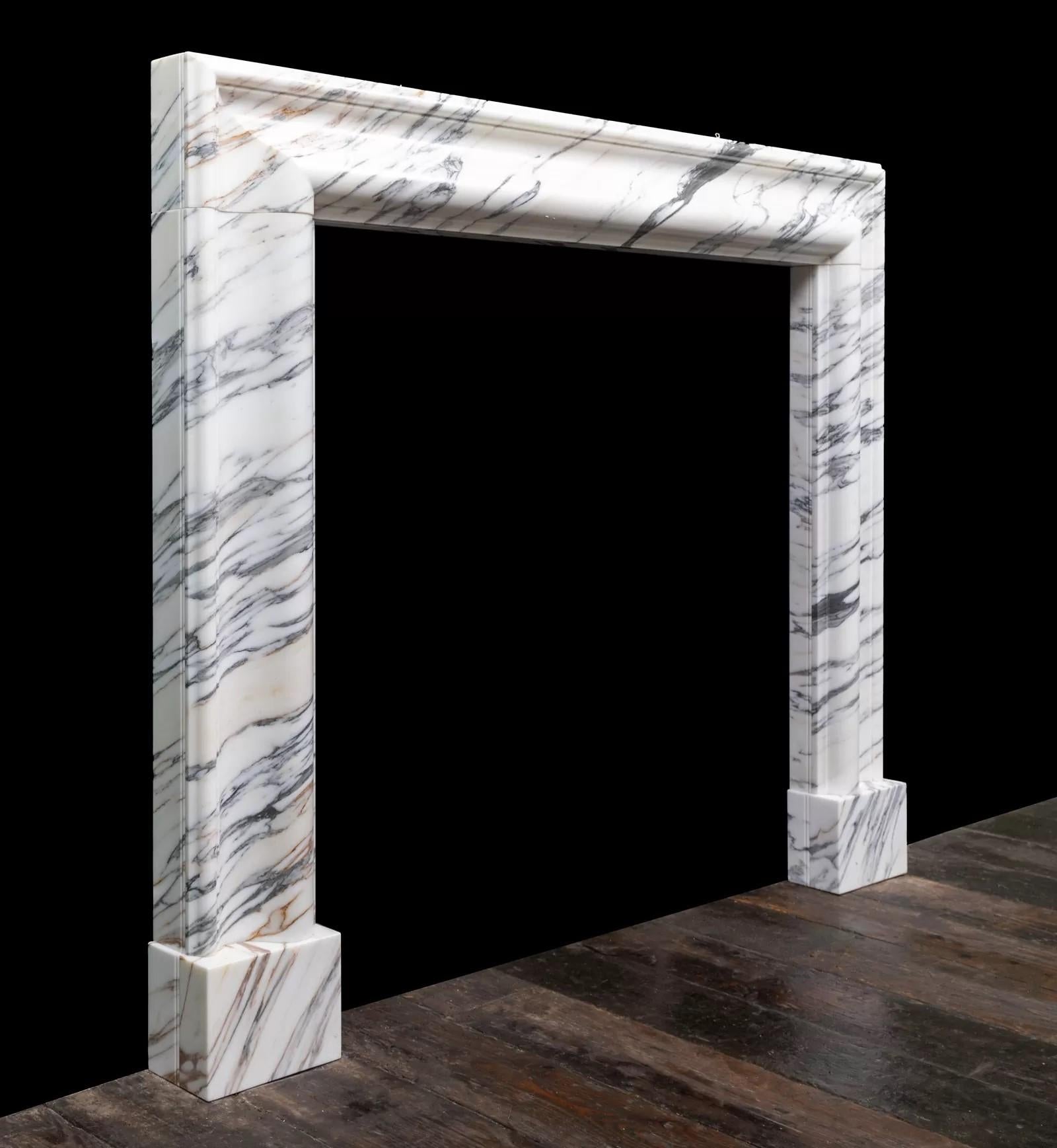 Northern Irish A arabescato marble bolection mantel by Ryan & Smith For Sale