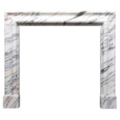 A arabescato marble bolection mantel by Ryan 
Smith