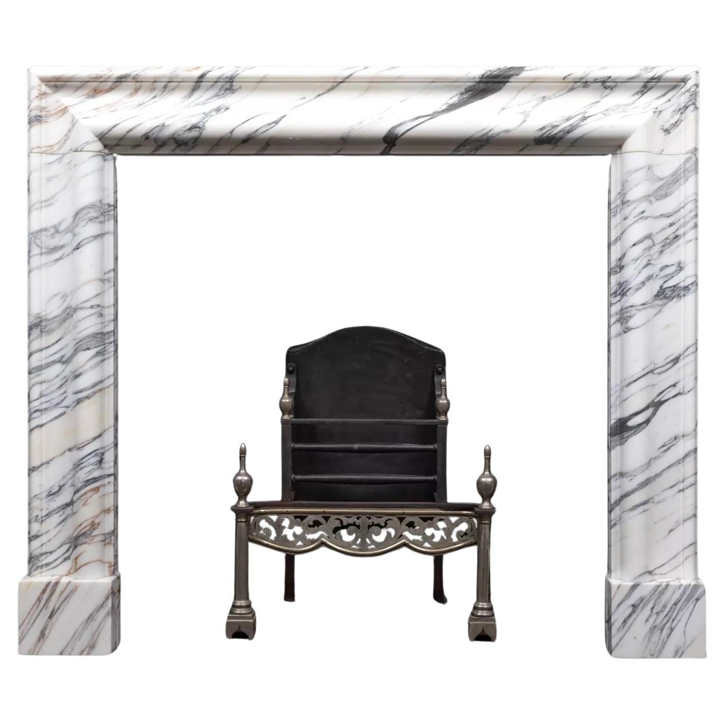A arabescato marble bolection mantel by Ryan & Smith For Sale