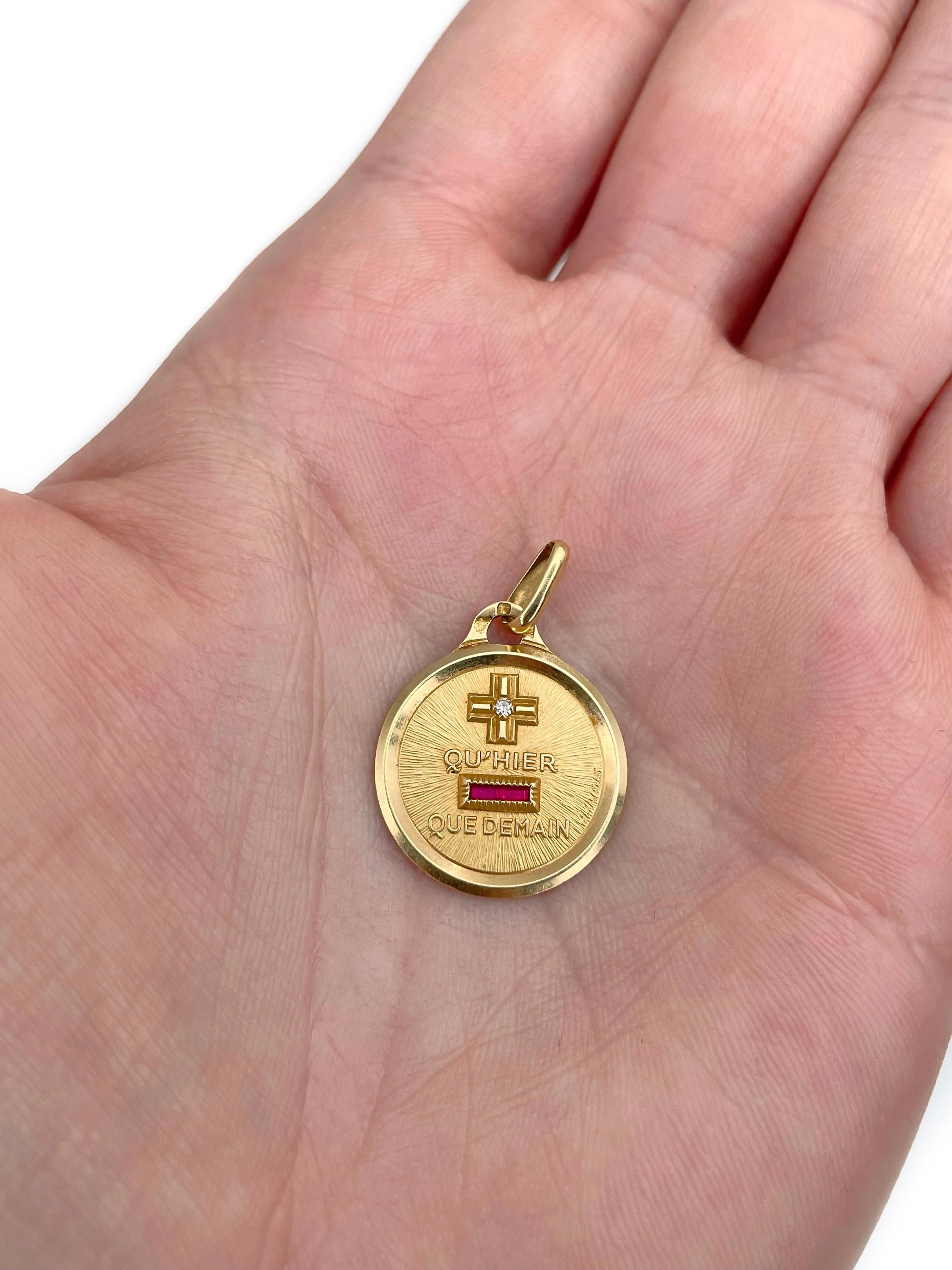 This is a love charm pendant crafted in 18K yellow gold. The piece features diamond and rectangular cut rubies. Circa 1950.

The design of the pendant is created by French jeweller Alphonse Augis in response to the love poem written by Rosemonde