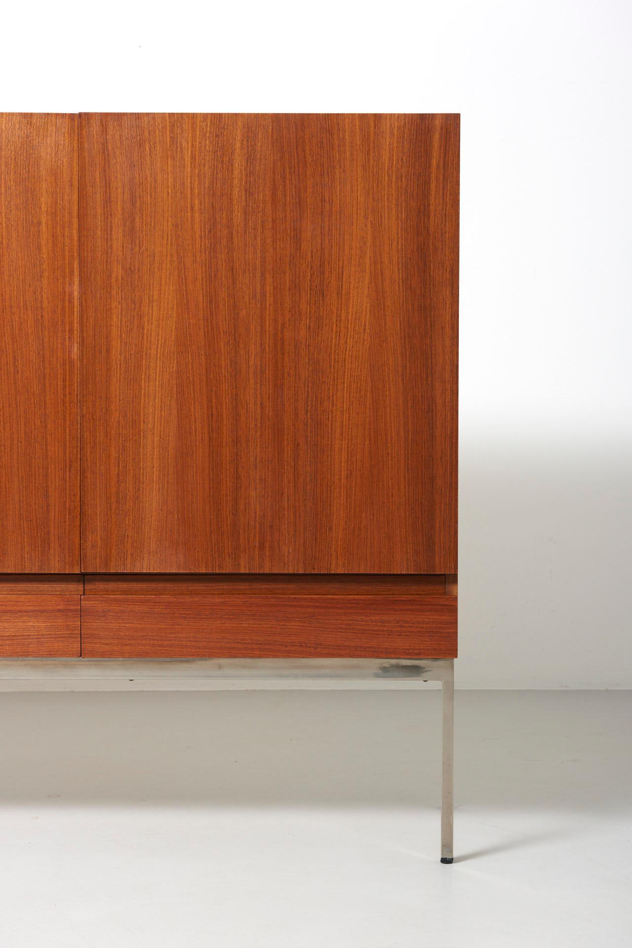 A B-60 sideboard in teak with chrome-plated frame. Design by Dieter Waeckerlin. Produced by Behr in Germany.