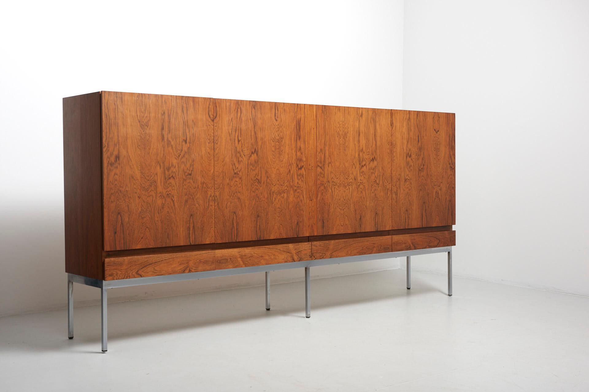 A B-60 sideboard with chromed metal base. Designed by Dieter Waeckerlin. Produced by Behr in Germany.