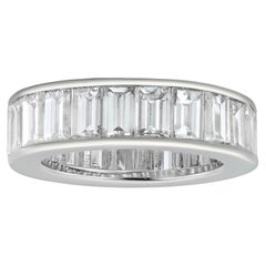 A baguette-cut diamond and platinum full eternity ring