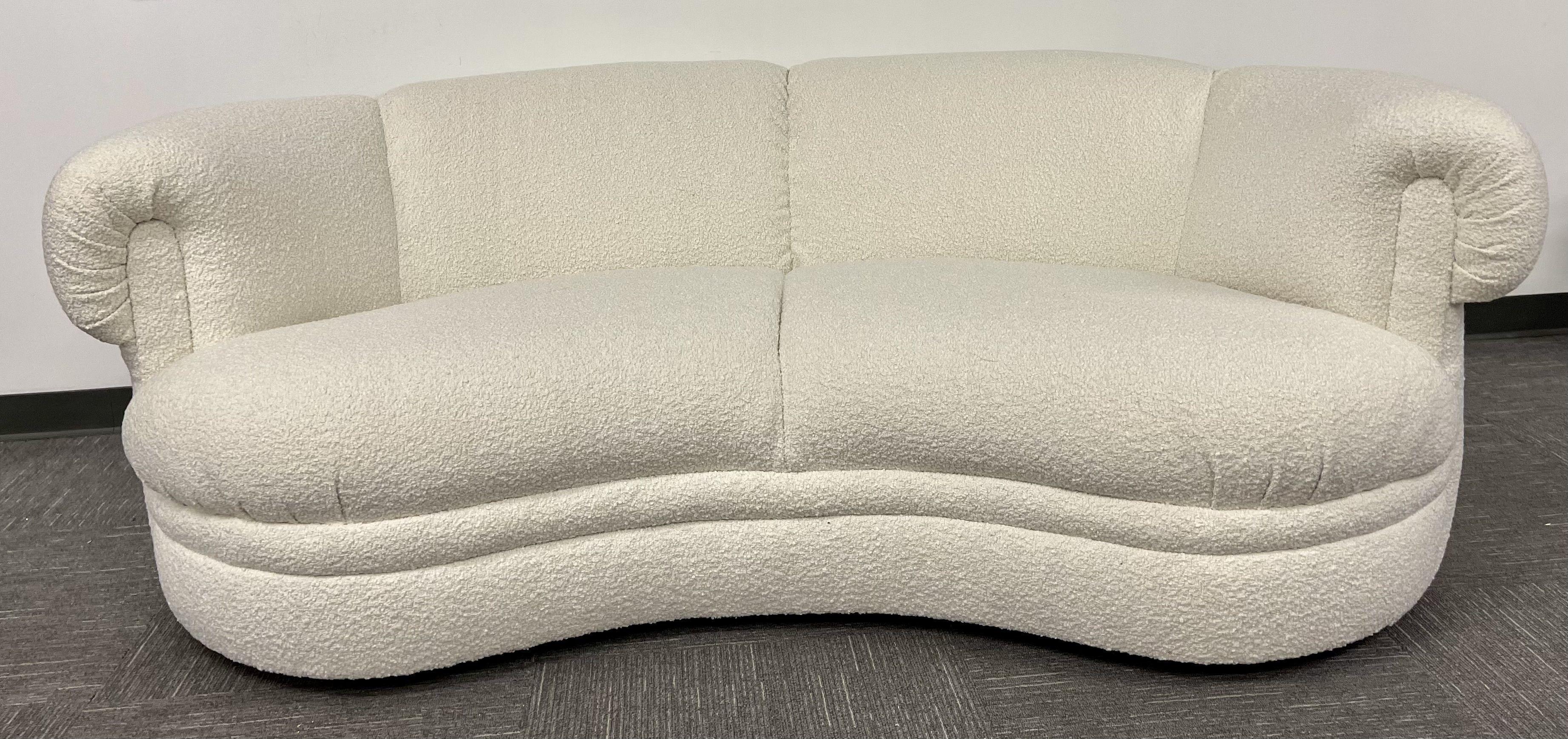 A Baker Cloud Sofa, Settee, Loveseat. New Boucle Fabric on this Baker Furniture Company Cloud Style Sofa or Settee. Great for any space in the home or office. The deep curved backrest would look stunning in the center of any home or office.
Seat