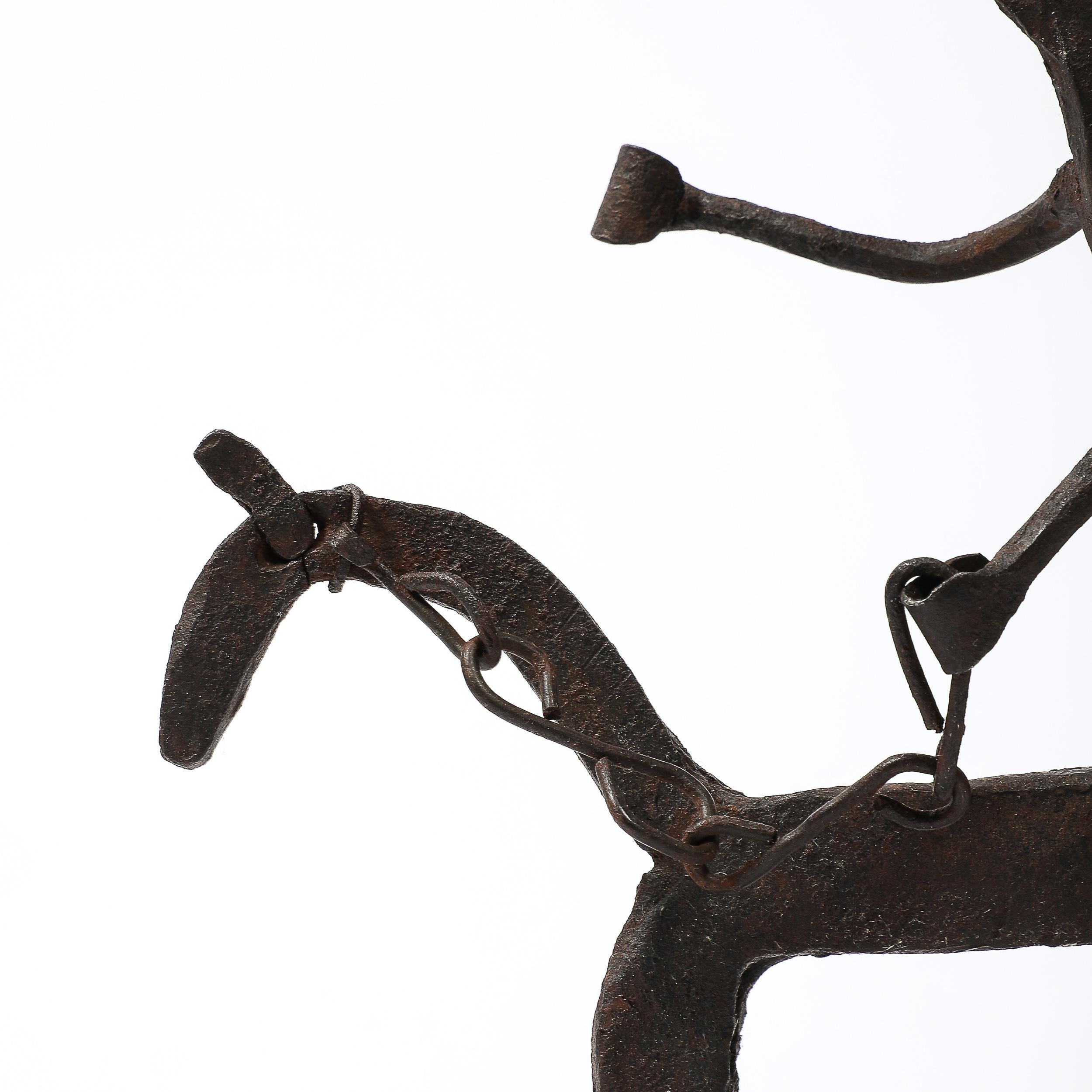 Escultura ecuestre de hierro forjado Bamana siglo XX en venta