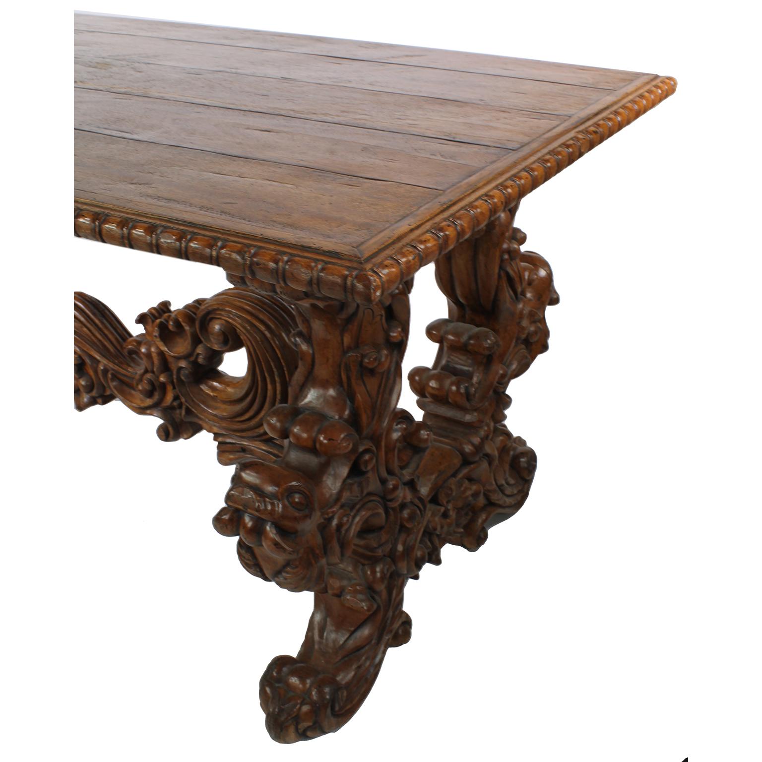 Baroque Revival Style Carved Wood Tavern or Farm Dining Pedestal Table In Fair Condition For Sale In Los Angeles, CA