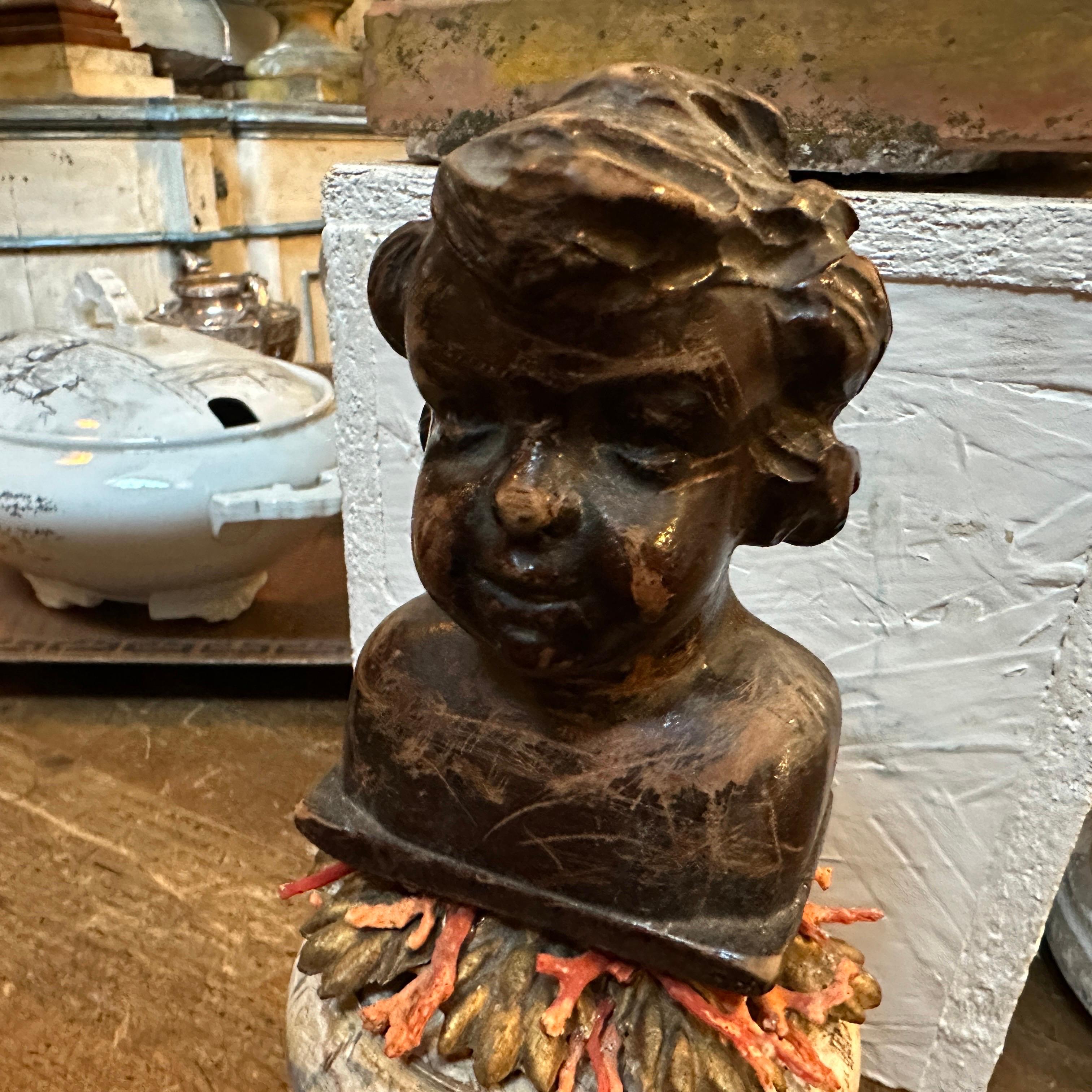 Hand-Carved A Baroque Revival Wood Bust of a Putto on a fake Marble Lacquered Wood Base For Sale