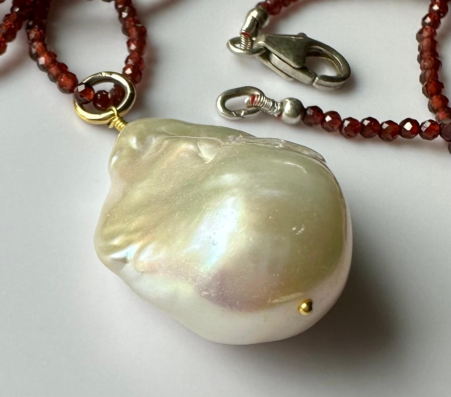 A Baroque South Sea Pearl Pendant hanging from a 24 Inch Beaded Garnet Necklace For Sale 3