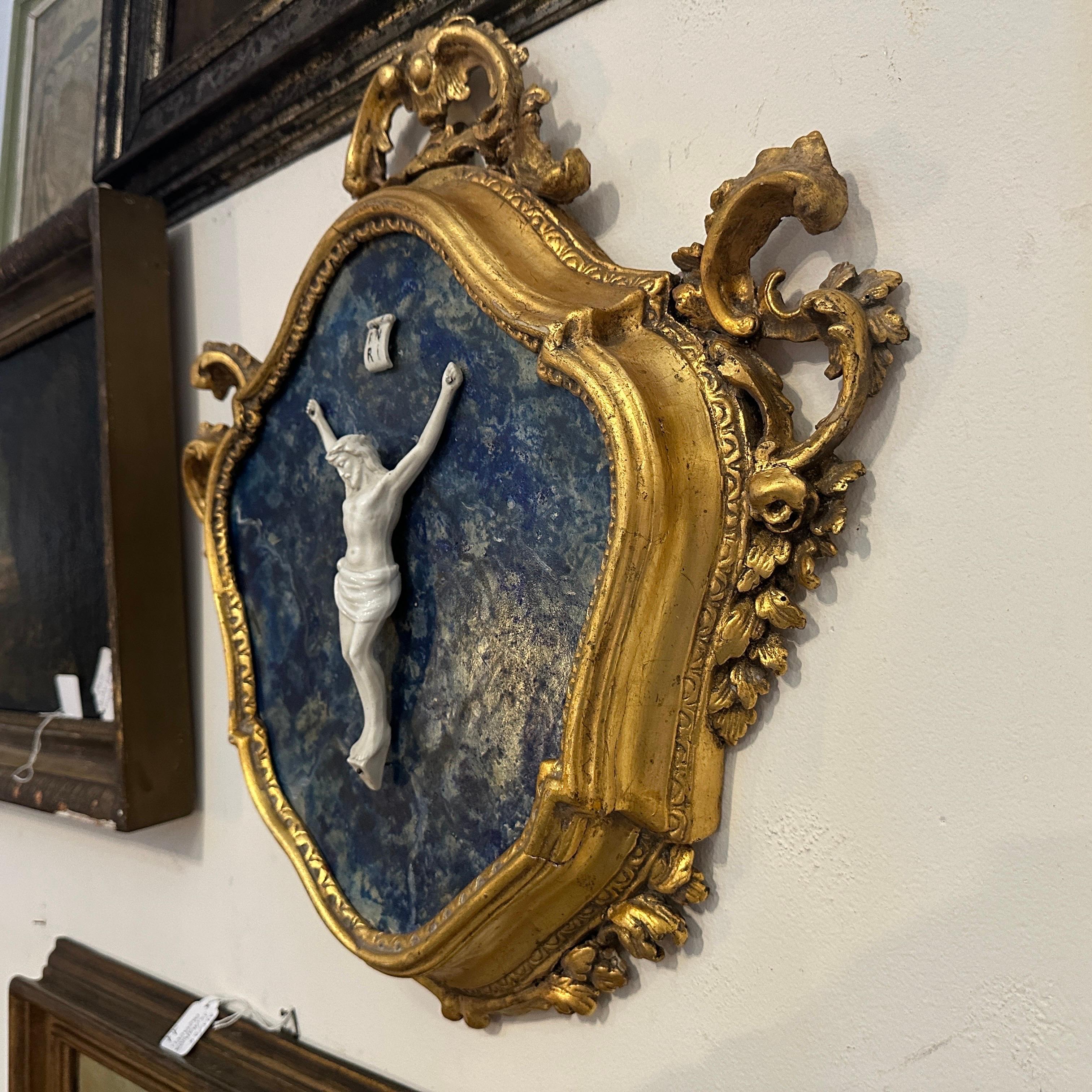 Ceramic A Baroque Style Gilded Wood Box Frame Displaying a White Porcelain Christ For Sale