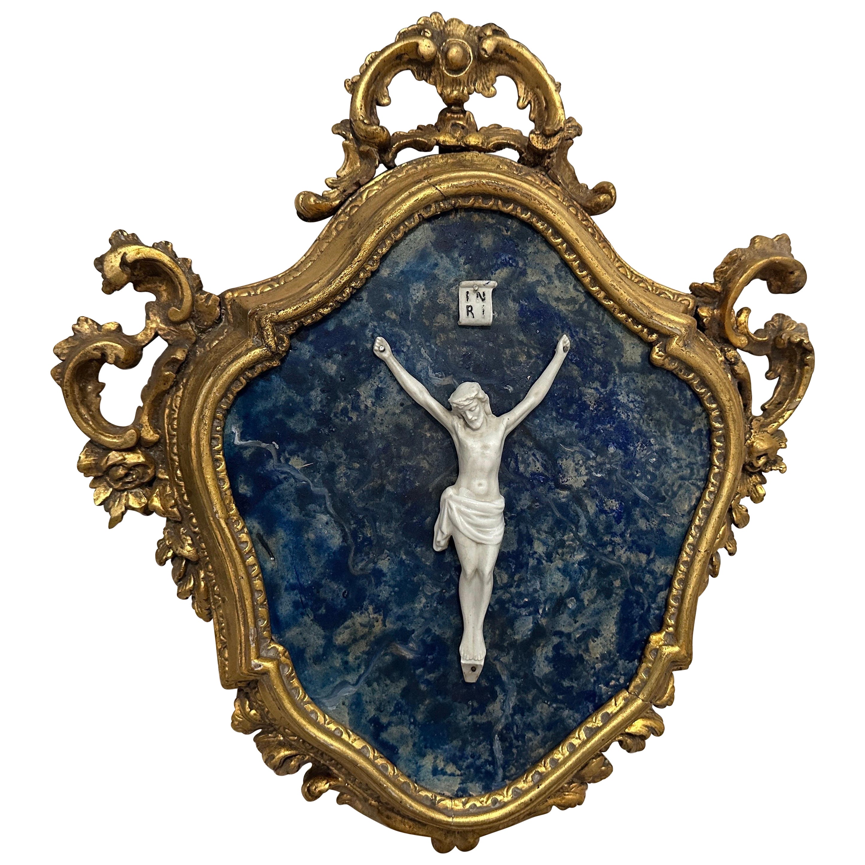 A Baroque Style Gilded Wood Box Frame Displaying a White Porcelain Christ For Sale