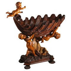 A Baroque Style Sculptural Carved Wood Cradle