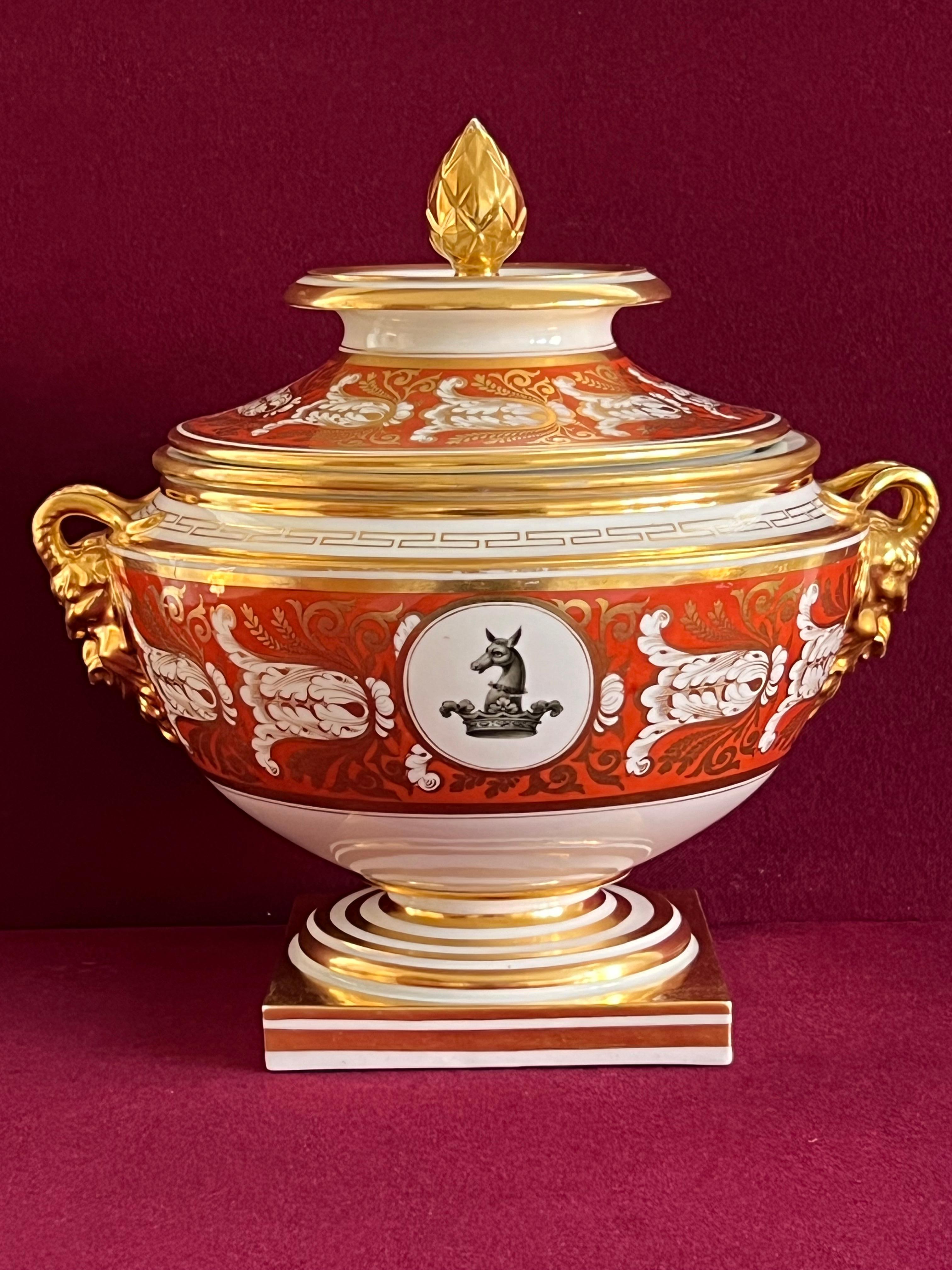A magnificent and rare Barr, Flight & Barr Porcelain Fruit Cooler c.1804-1813. Superbly decorated with a continuous deep orange ground band and heavily gilded, highly detailed rams head handles, greek key motif to header and a crowned deer armorial