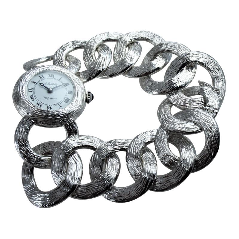 FACTORY / HOUSE: A. Barthelay for Morabito
STYLE / REFERENCE: Open Link Bracelet Watch
METAL / MATERIAL: Sterling Silver
DIMENSIONS: Length 25mm  X Diameter 25mm
CIRCA: 1970's  / 80's
MOVEMENT / CALIBER: 17 Jewels / Manual Winding
DIAL / HANDS: