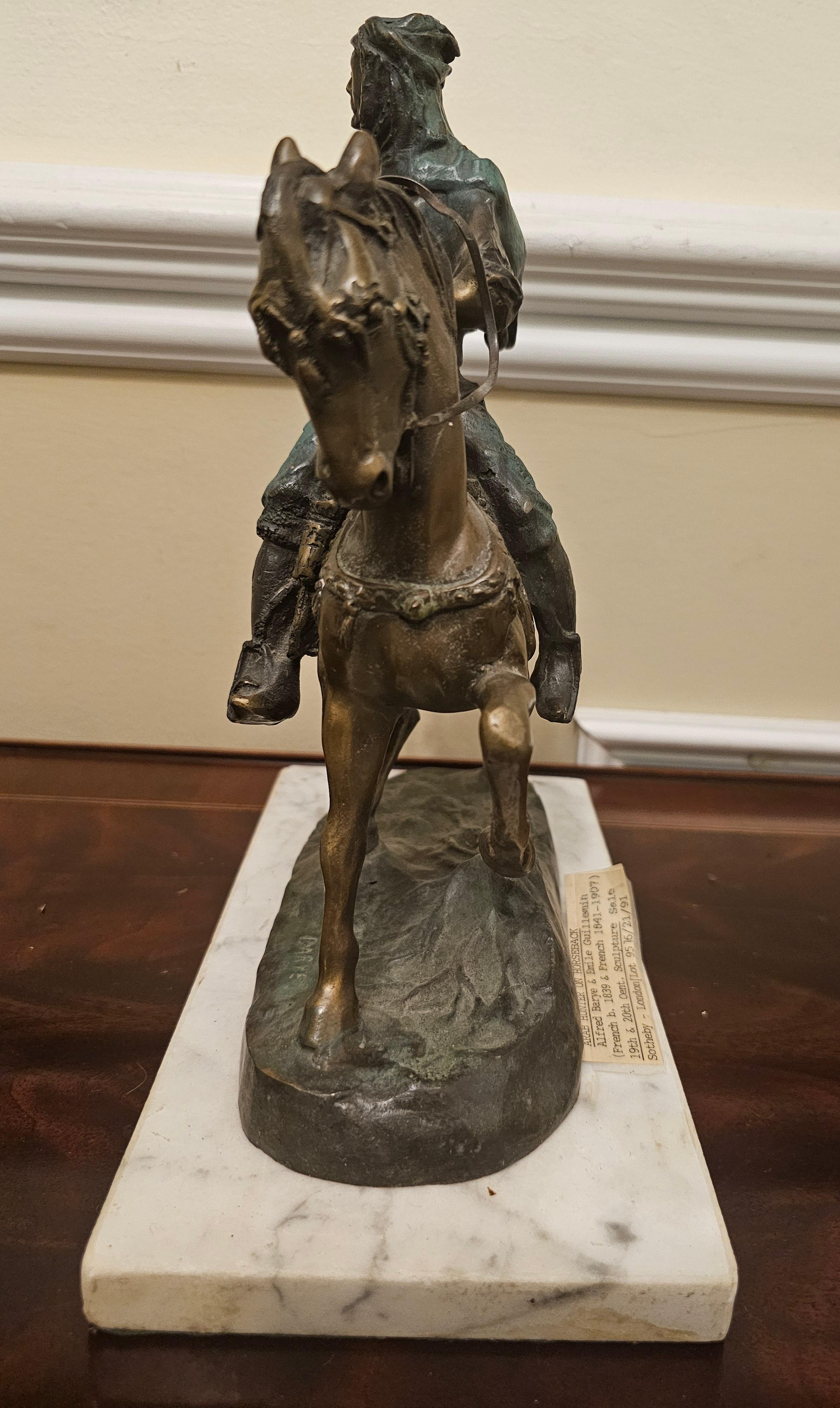 Français A Barye & Emile Guilemin, chasseur arabe à cheval en bronze patiné vert-gris  en vente