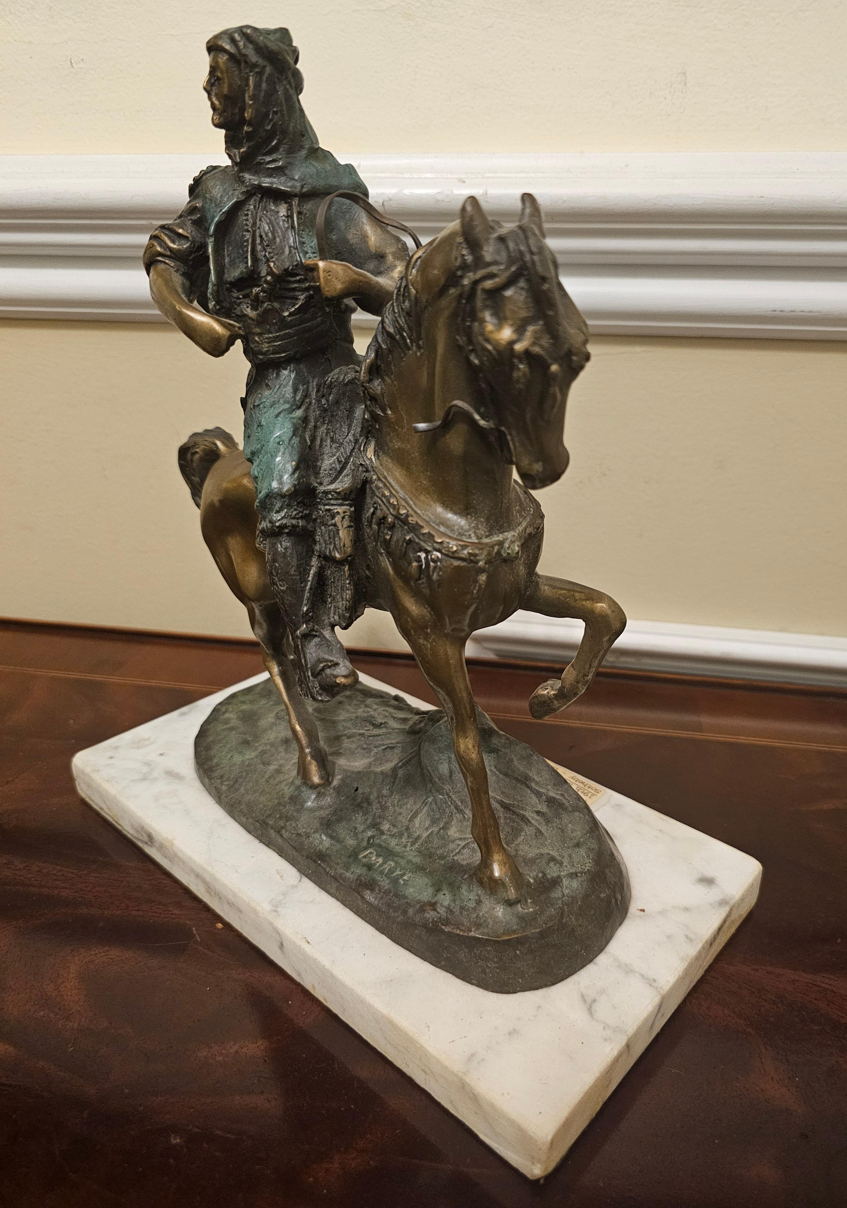 XIXe siècle A Barye & Emile Guilemin, chasseur arabe à cheval en bronze patiné vert-gris  en vente
