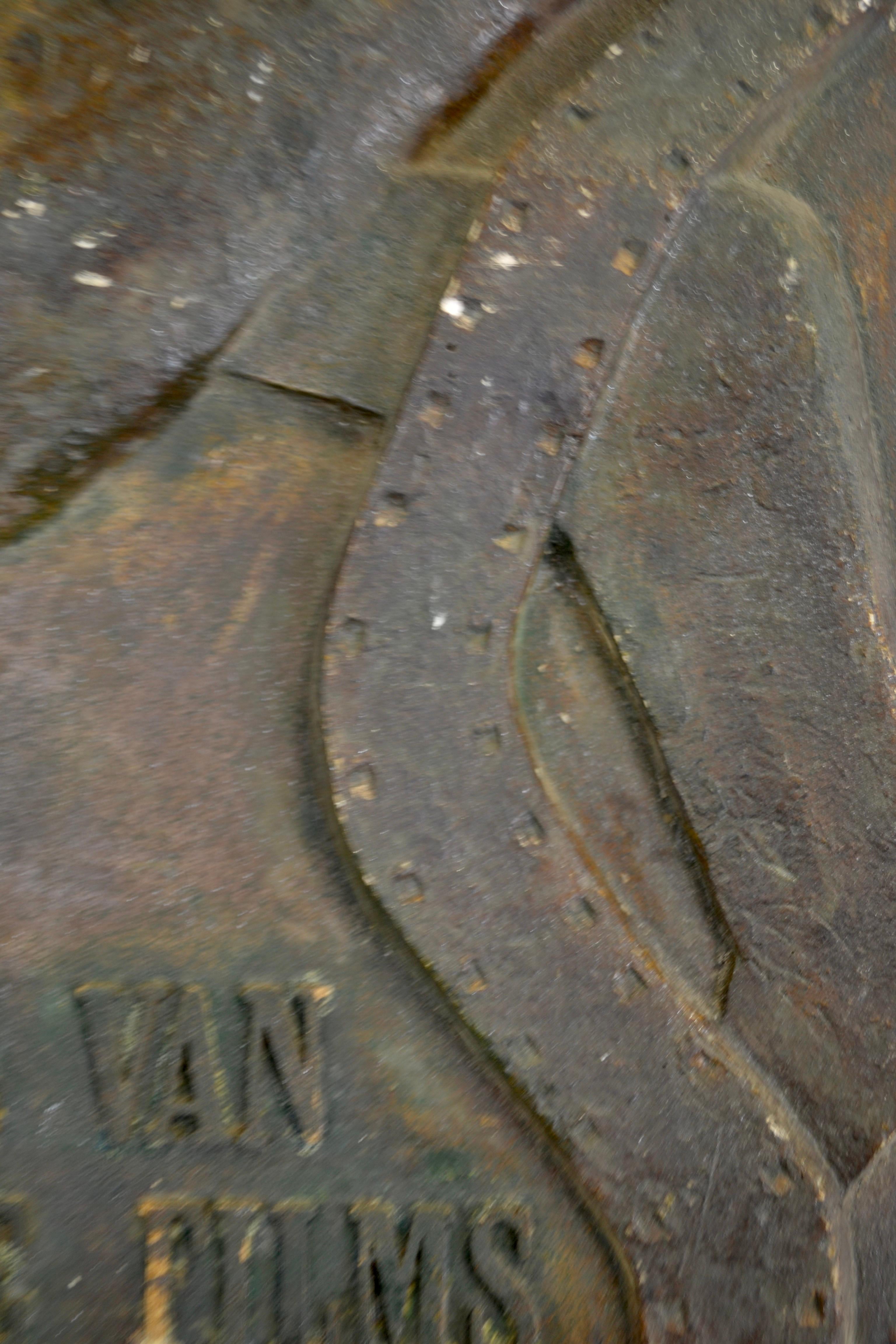 A bas-relief crafted from plaster dating back to the 1960s, presumably serving as a trophy, bears the inscription commemorating the 1960 International Belgian Film Festival held in Antwerp.