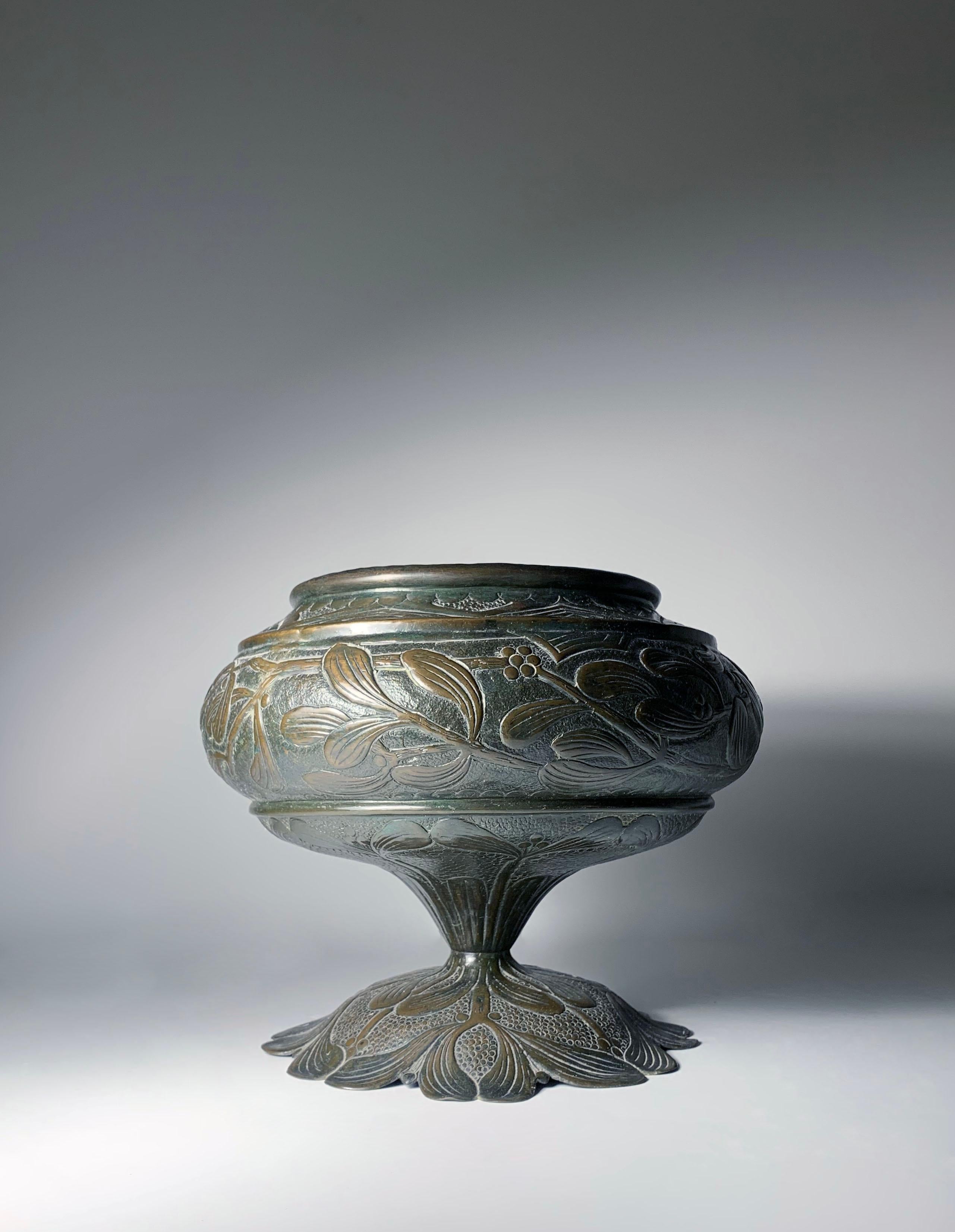 Art Nouveau Hammered Metal Planter Urn or Lamp Base by A. Bastet Lyon.  Signed.

Uncertain if this was meant to be a planter with possibly an insert. Or if designed to be a table lamp base (requiring new basic hardware). There is a hole at the