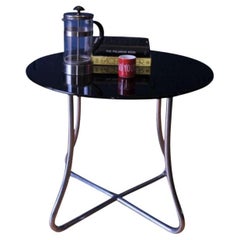A Brutalist  Art Deco Black Glazed Round Side Table With Curved Steel Frame