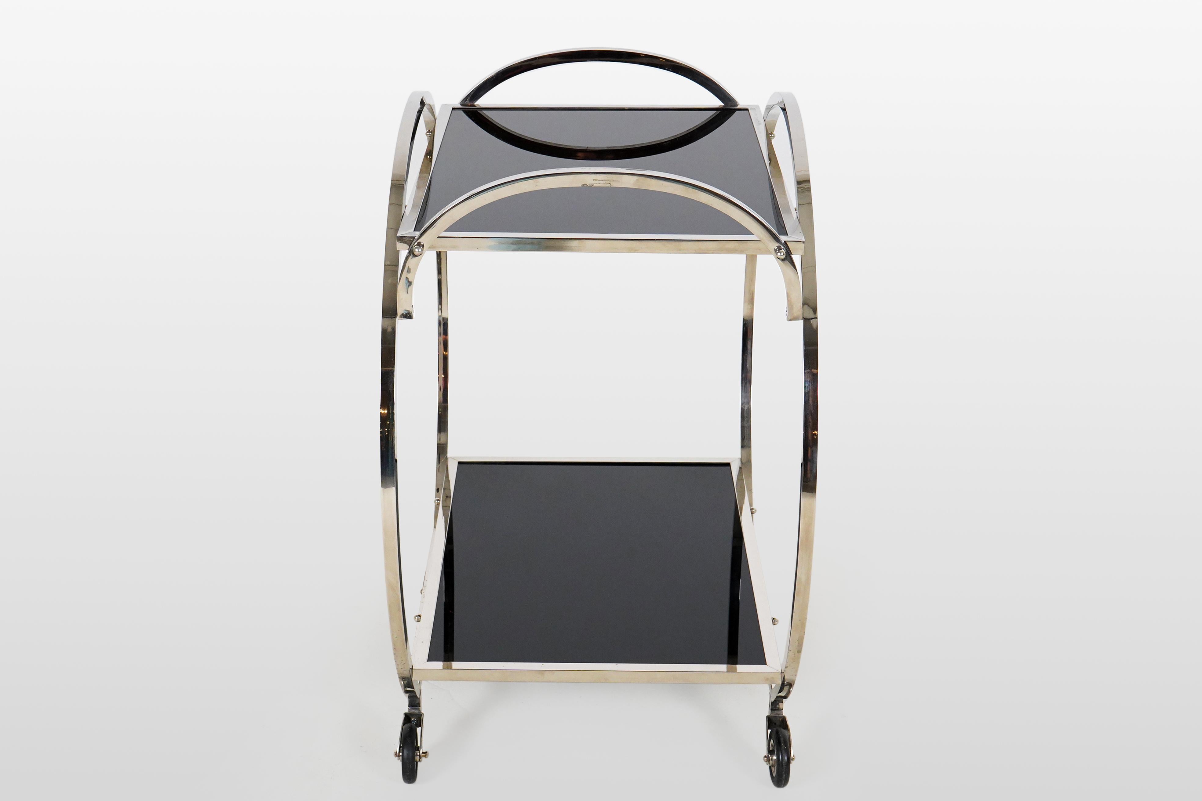 Bauhaus-Inspired Bar Cart with Chrome Frame and Glass Shelves In Good Condition For Sale In Chicago, IL