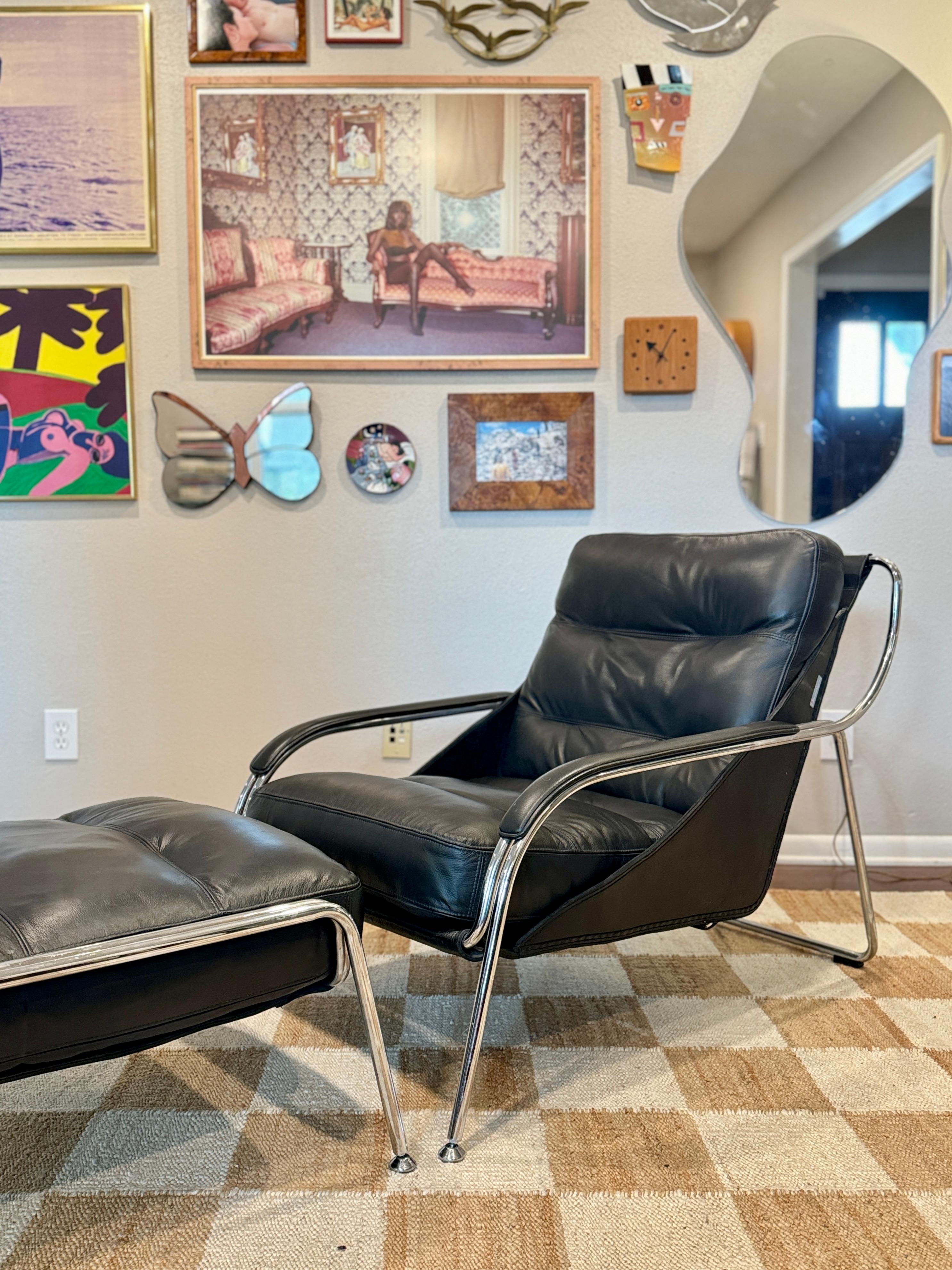 A bauhaus style black leather and chrome lounge chair and ottoman 10