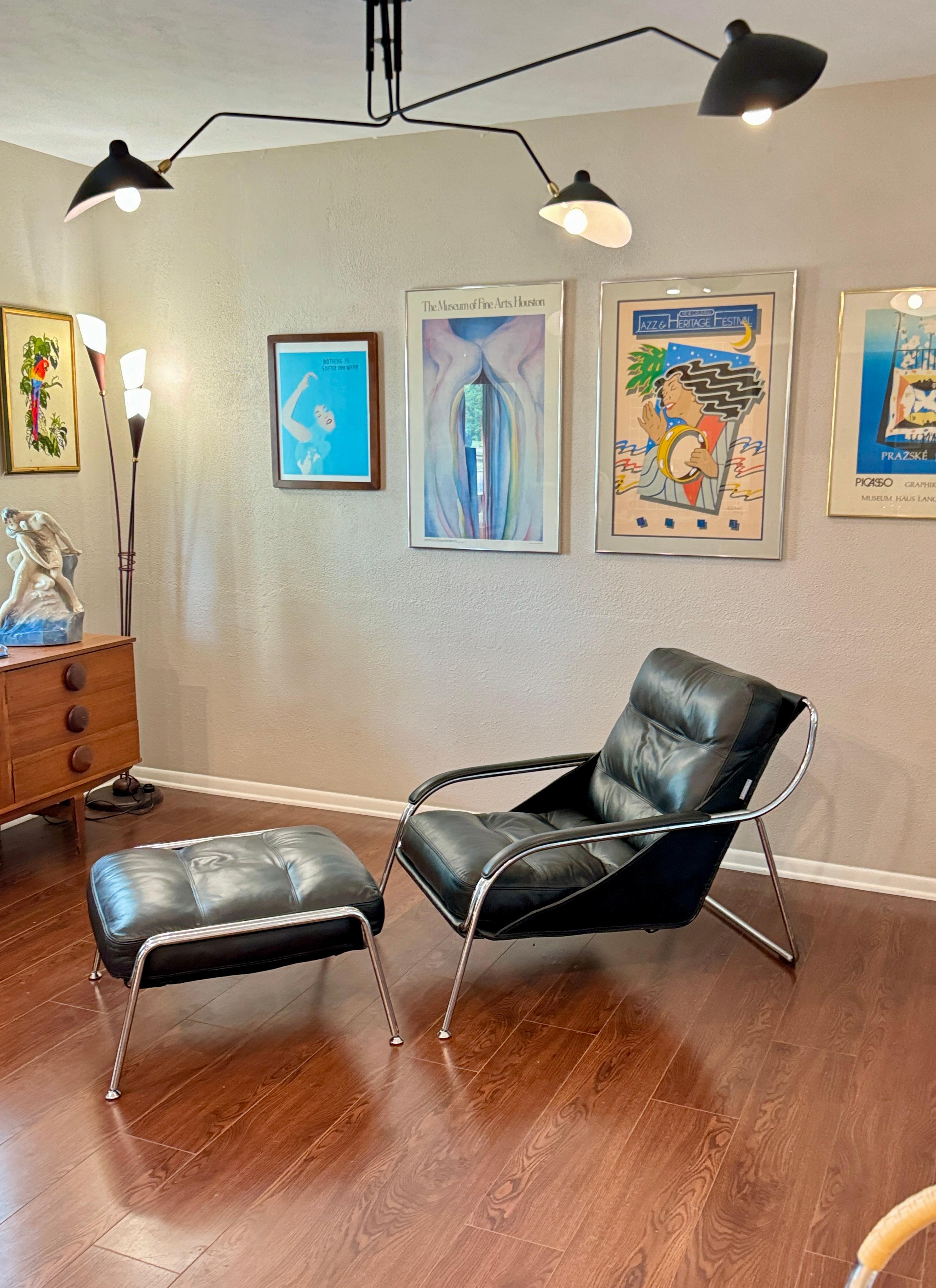 Bauhaus A bauhaus style black leather and chrome lounge chair and ottoman