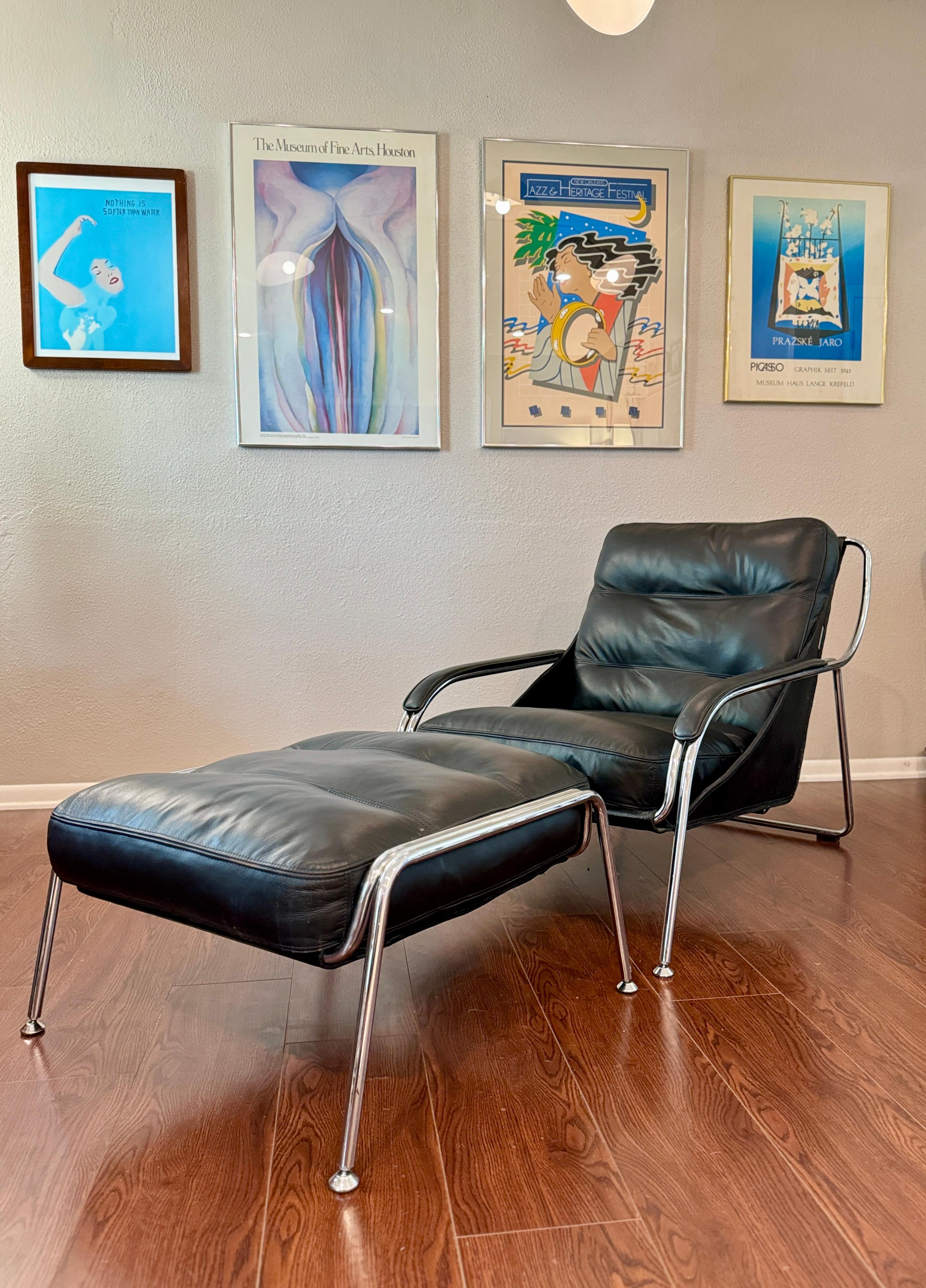 South American A bauhaus style black leather and chrome lounge chair and ottoman