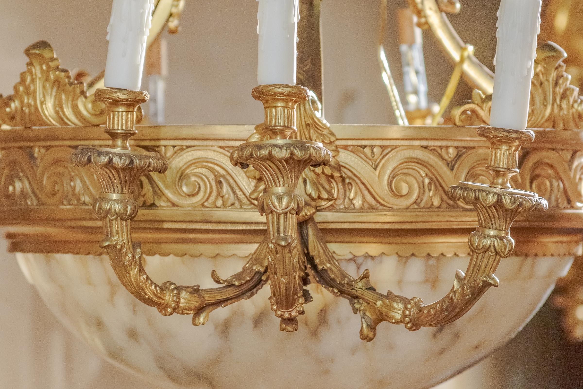 A beautiful French 19th century alabaster and gilt bronze Louis XVI chandelier.