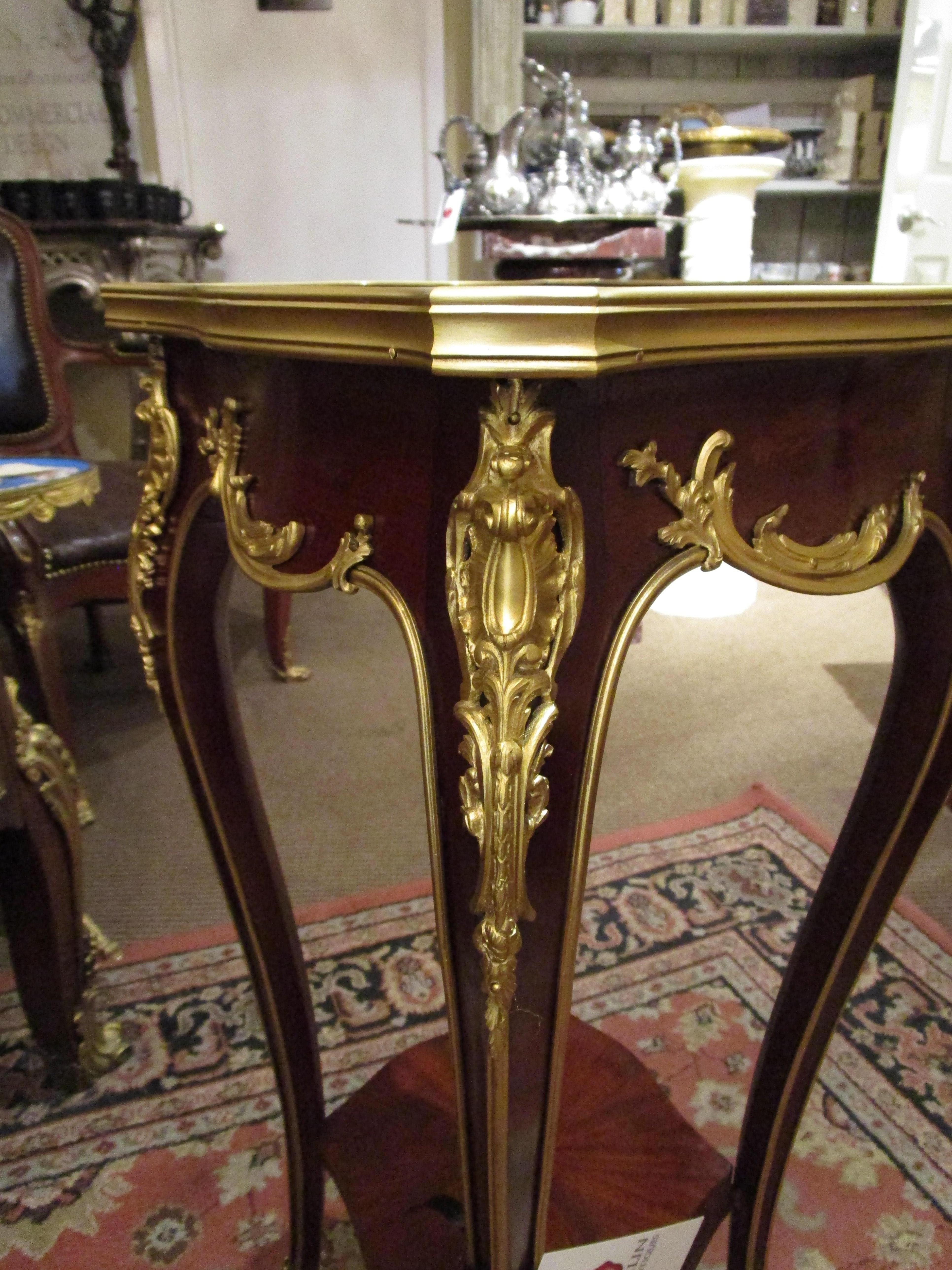 Louis XV A beautiful 19th  French  side table . Mahogany and gilt bronze mounts by Durand For Sale