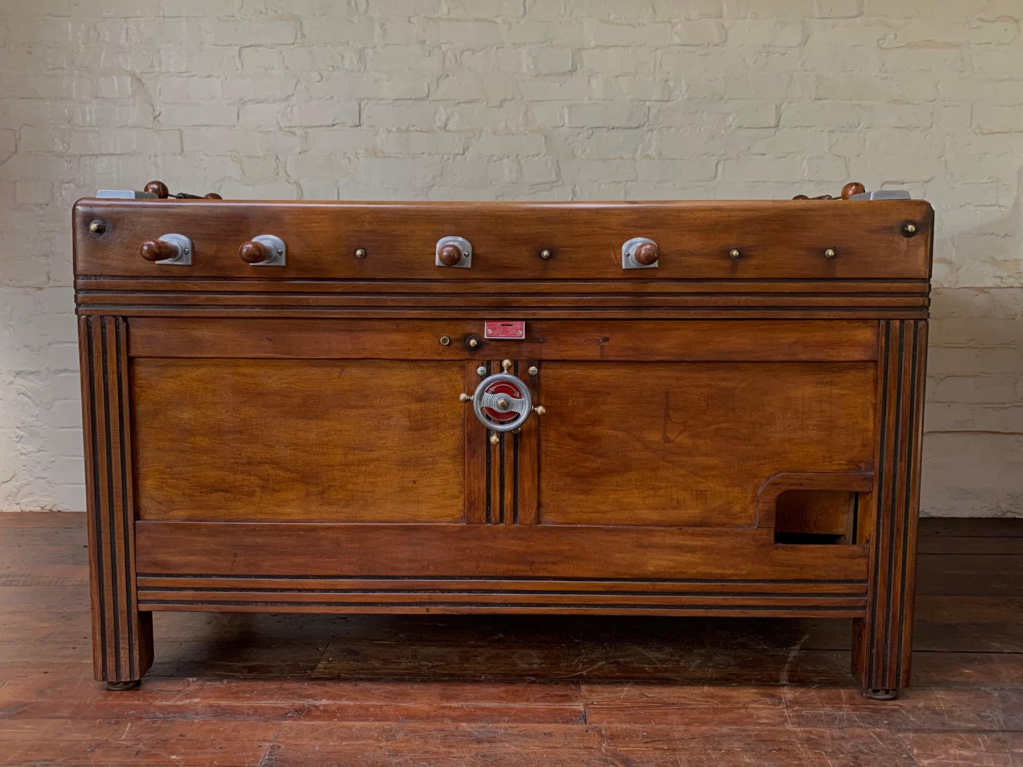 This beautiful and rare football table is definitely one for the collectors. 
It’s been sympathetically restored therefore preserving some of its vin-tage charm, but at the same time being 100% usable. 

To play these tables is to understand them,