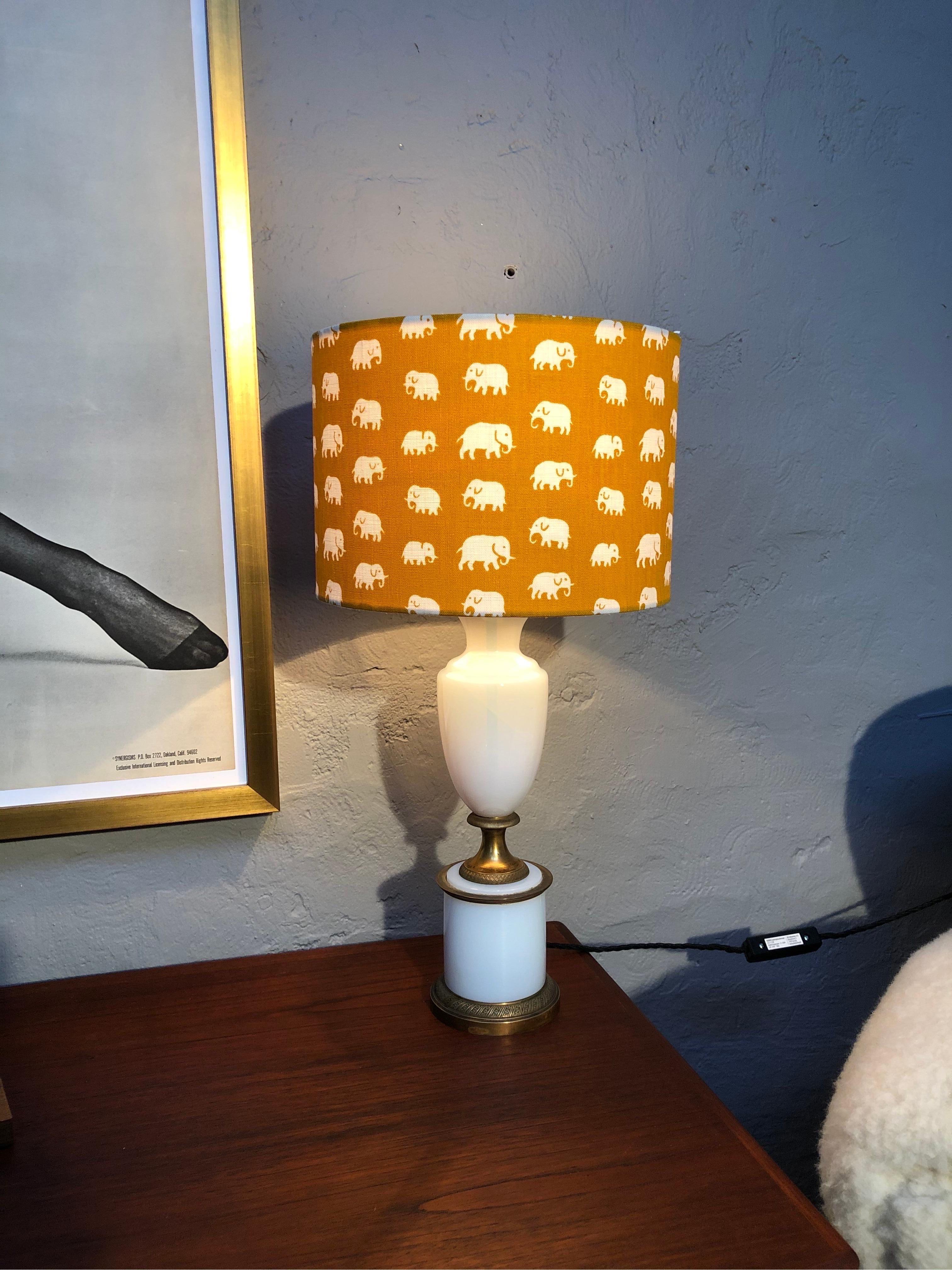 A very elegant antique table lamp in opaline glass and brass.
Rewired with 1.7m of black twisted cloth flex with an inline dimmer switch.
Also a new E27 bulb holder and grounded.
Topped off with a beautiful Svensk Tenn elephant lampshade.
Can be