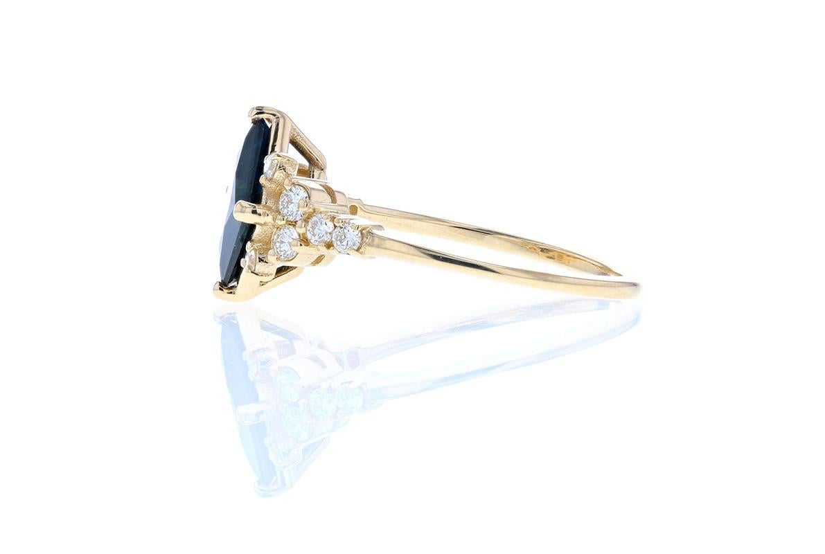 sapphire and diamond engagement ring yellow gold