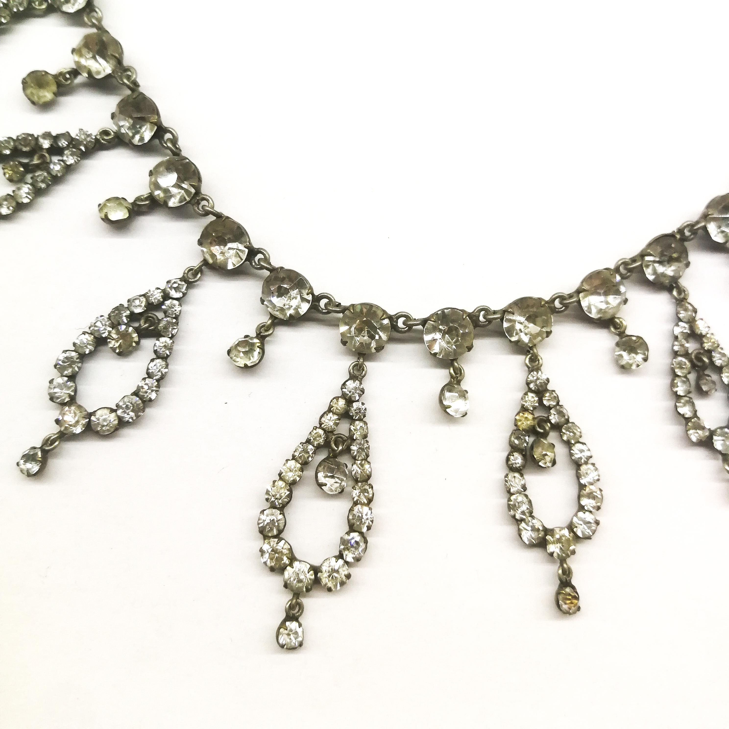 A beautiful clear paste festoon necklace, with graduated drops, French, 1910/20. In Good Condition In Greyabbey, County Down