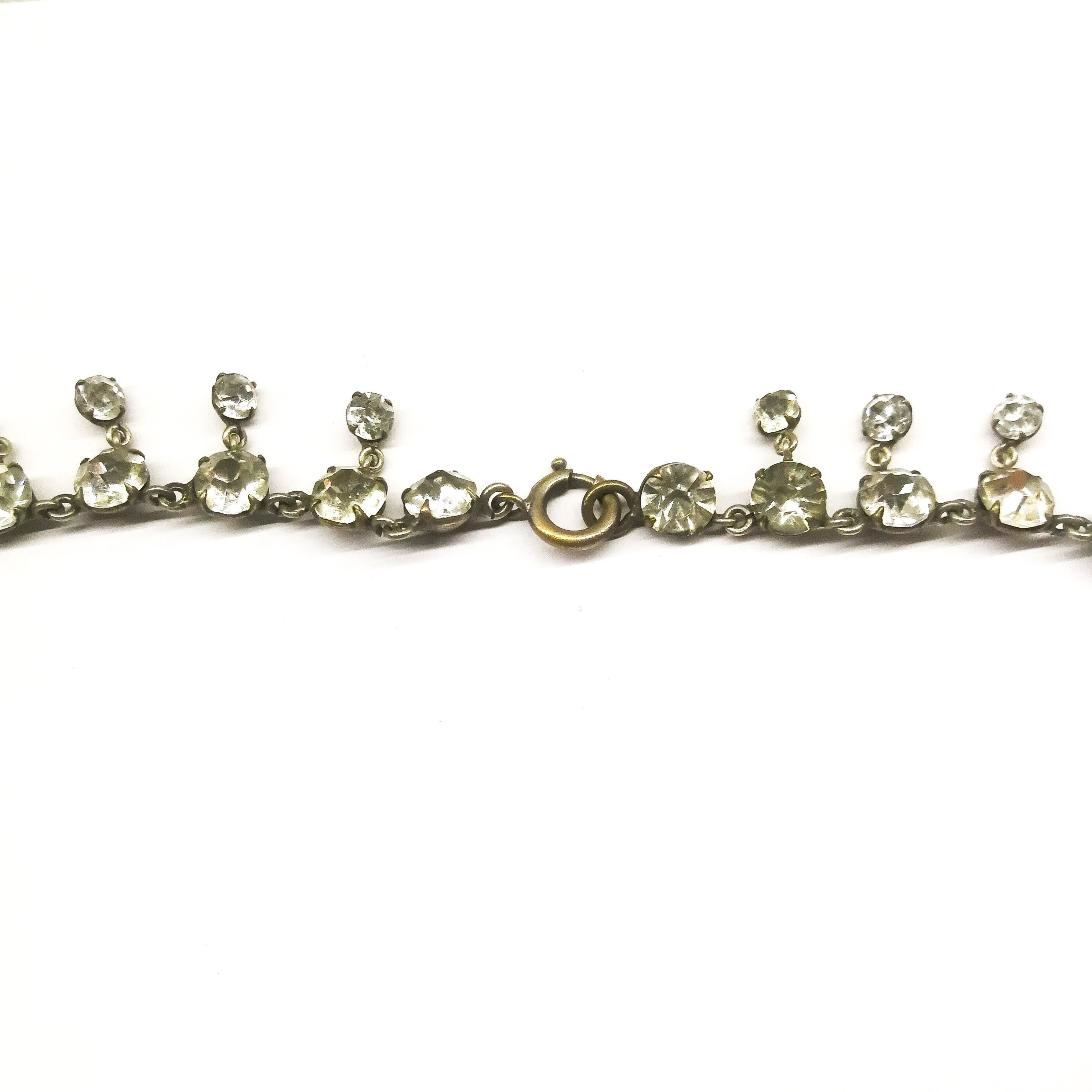 A beautiful clear paste festoon necklace, with graduated drops, French, 1910/20. 1