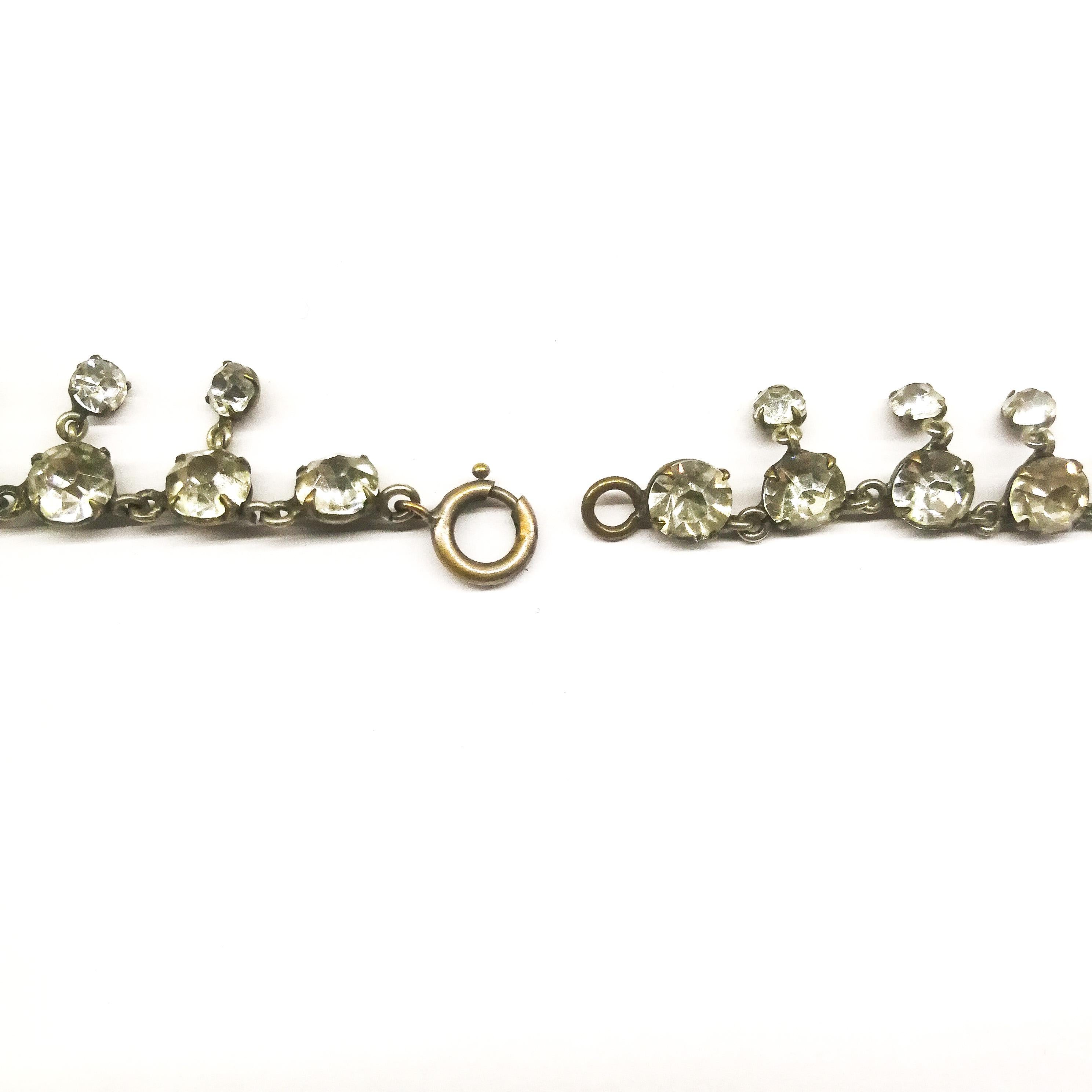 A beautiful clear paste festoon necklace, with graduated drops, French, 1910/20. 2