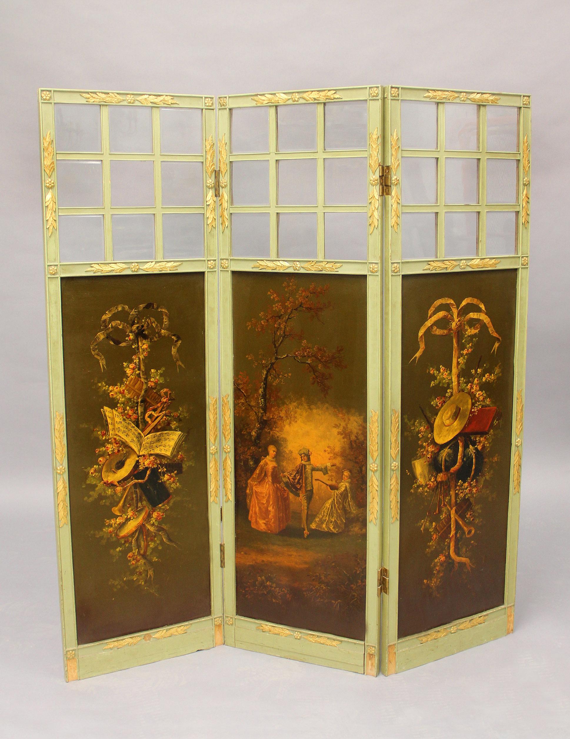 A Beautiful Early 20th Century Gilt and Painted Wood Three Panel Floor Screen

Rectangular shaped hand painted panel screen, the center panel depicting a courting couple strolling, the two side paintings with musical instruments, trophies and