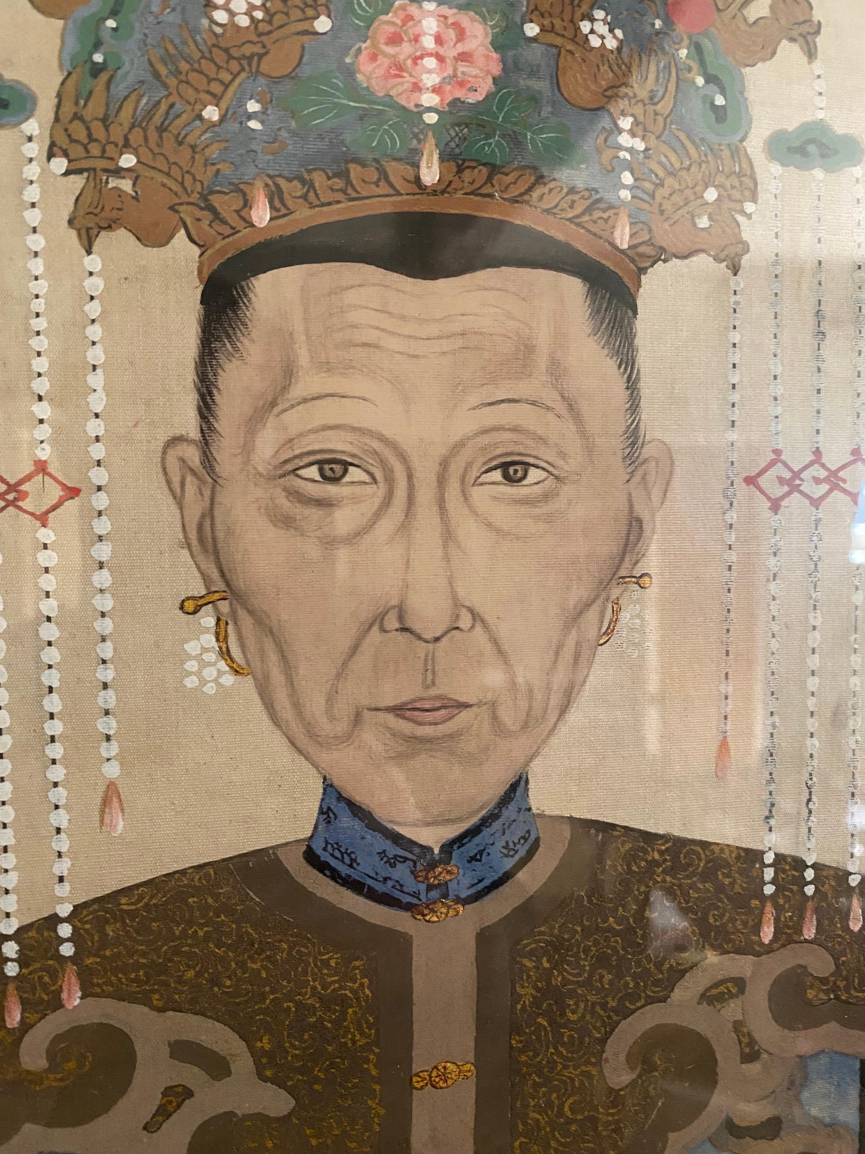A very fine example of a late 19th / early 20th century Chinese ancestral portrait on silk. 

The colours are extremely strong and vibrant with wonderful detailing to the face and costume. Unfortunately there appears to be some water damage or