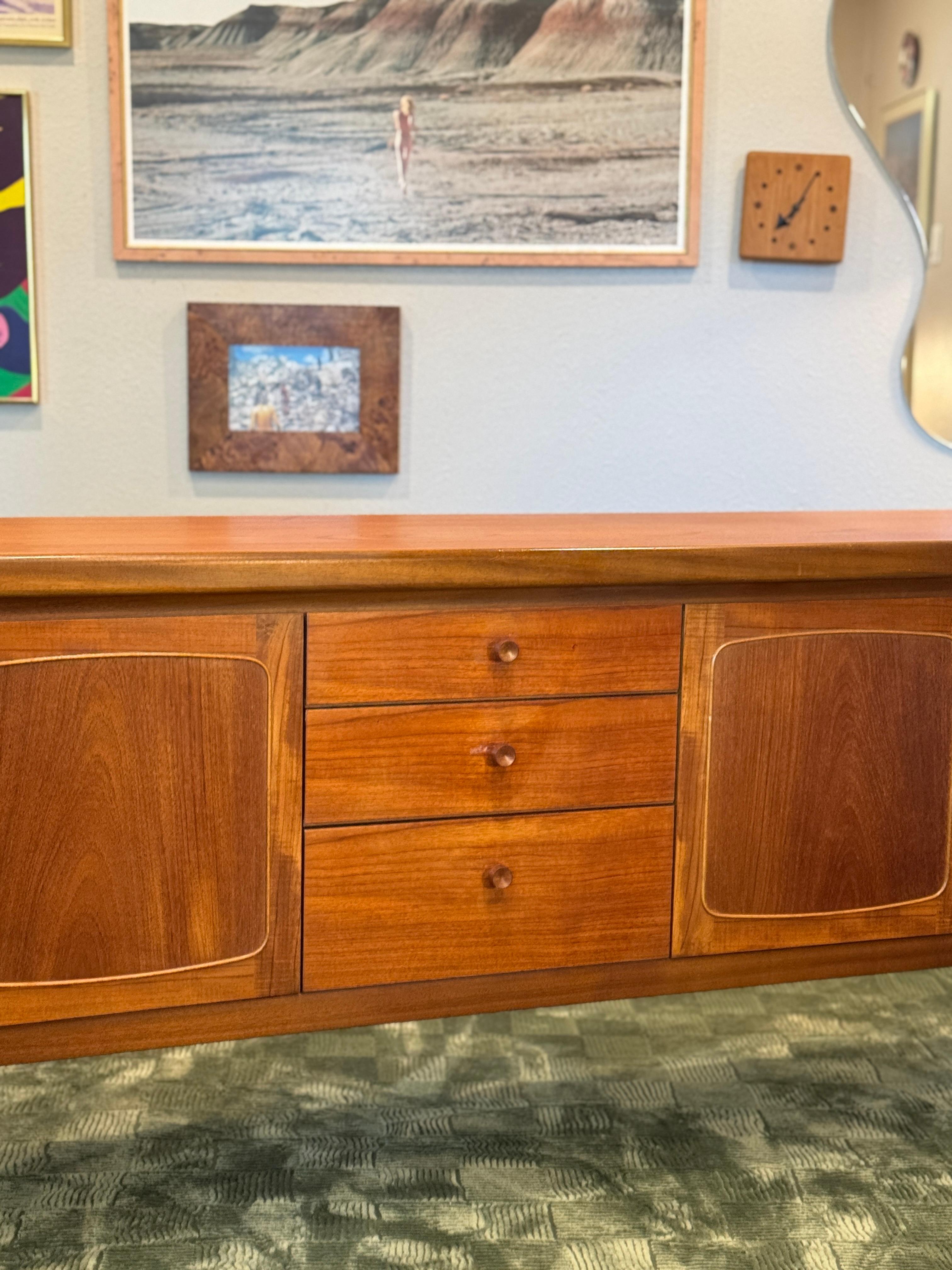 European A beautiful, extra long teak sideboard by Nathan Furniture, called “Squares.” For Sale