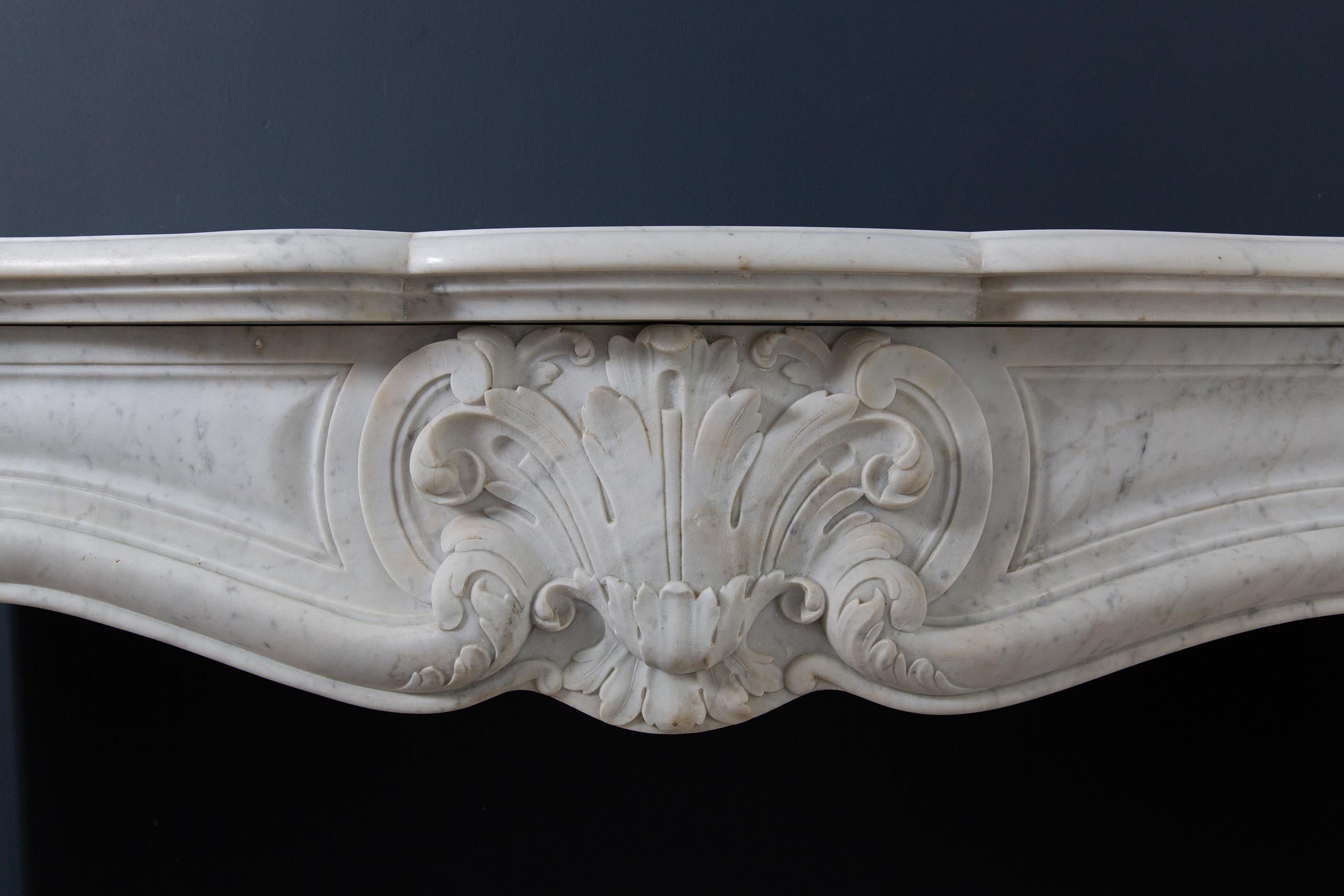Hand-Carved Beautiful French Antique Fireplace in Louis XV Style, Made of Carrara Marble