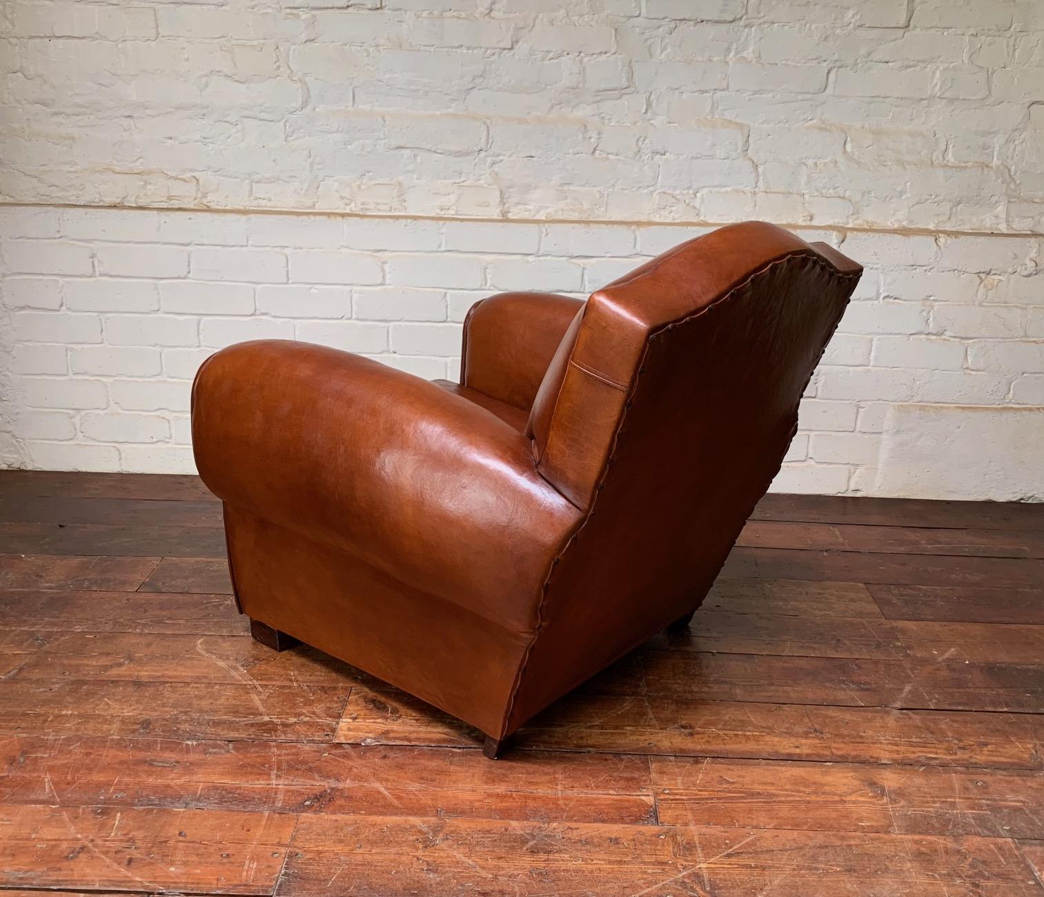 Leather A Beautiful French leather Club Chair, Chapeau de Gendarme Model, circa 1950’s