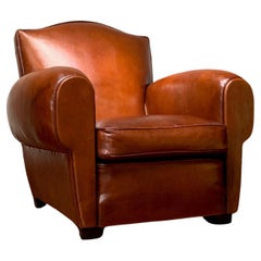 A Beautiful French leather Club Chair, Chapeau de Gendarme Model, circa 1950’s