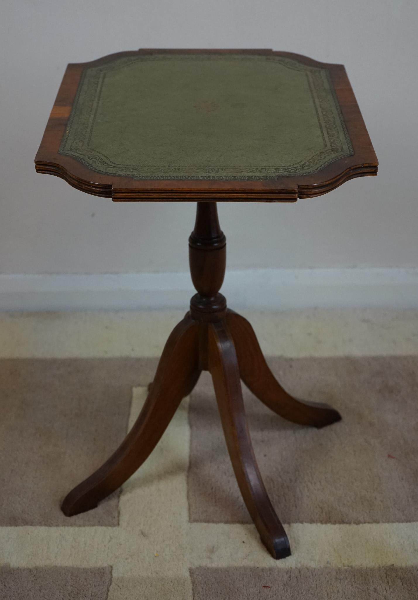 
A Beautiful Georgian Style Wine Table Made By Bevan Funnell Reprodux.
For sale an beautiful Georgian style rectangular shaped snap top wine table with green leather surface, raised on pillar and tripod base .
Dimensions
H - 52 cm

W - 50