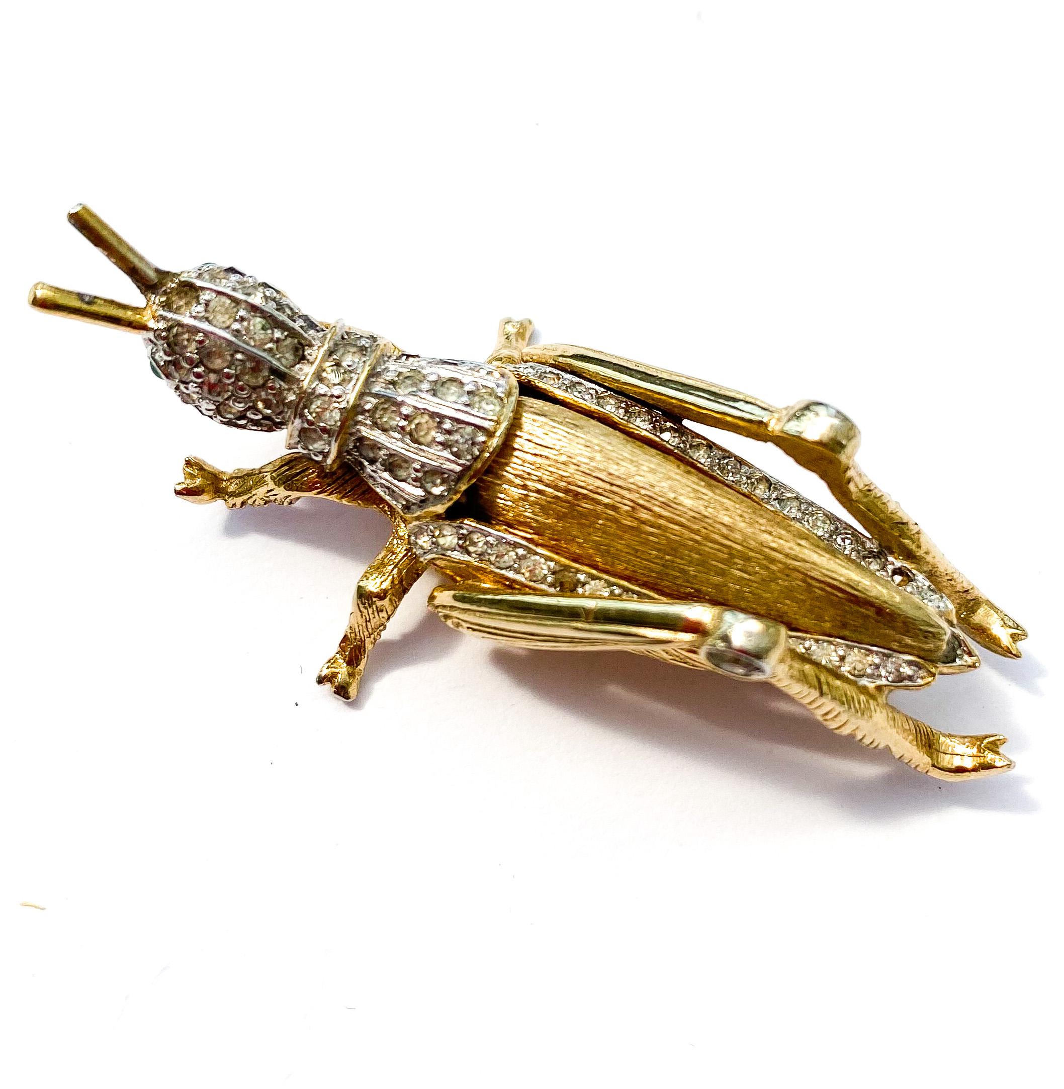 A beautiful gilt and clear paste 'grasshopper' brooch, Nettie Rosenstein, 1960s. In Excellent Condition For Sale In Greyabbey, County Down